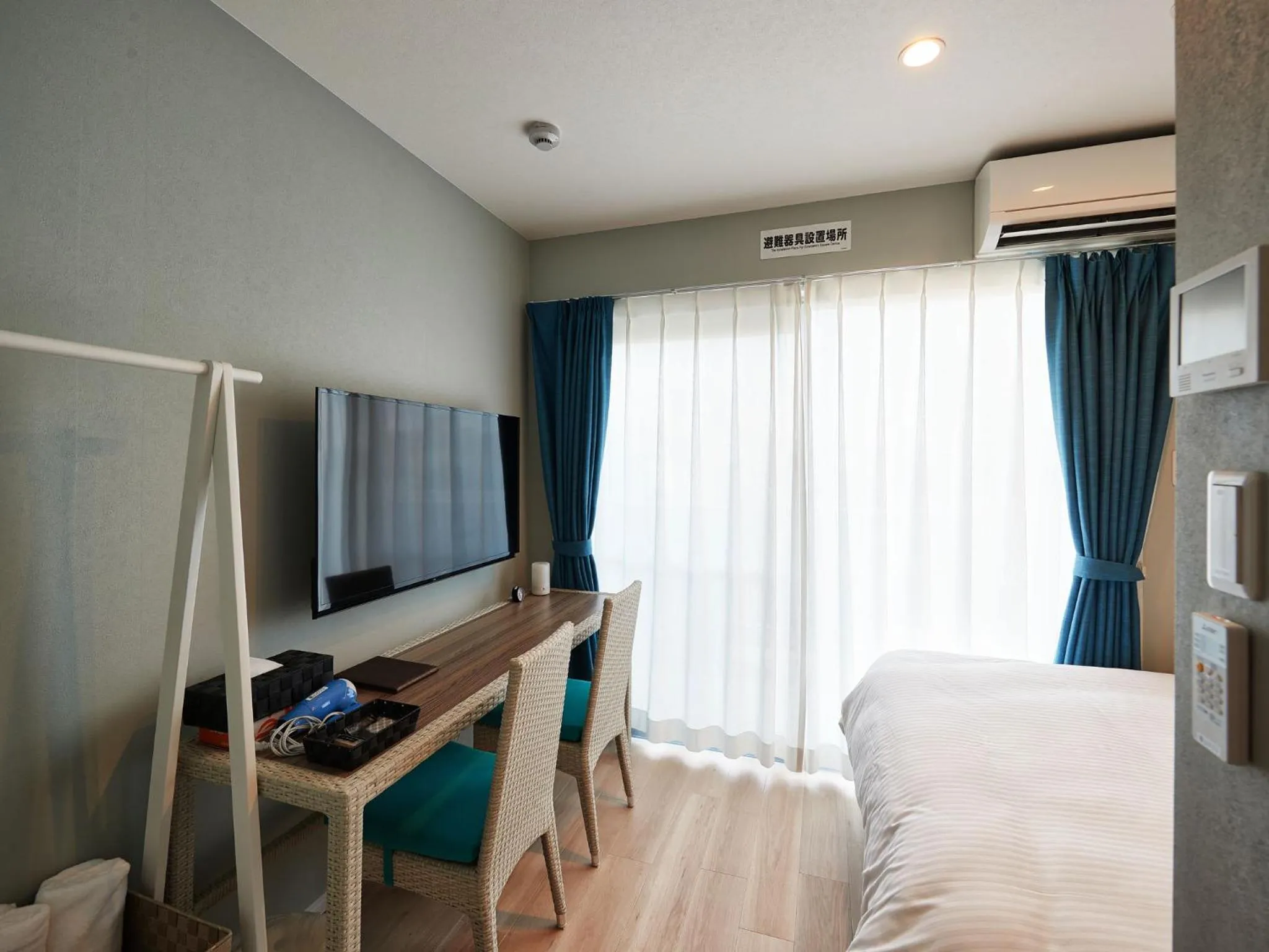 Photo of the whole room, Bed in Tenpoint Hotel OKOU