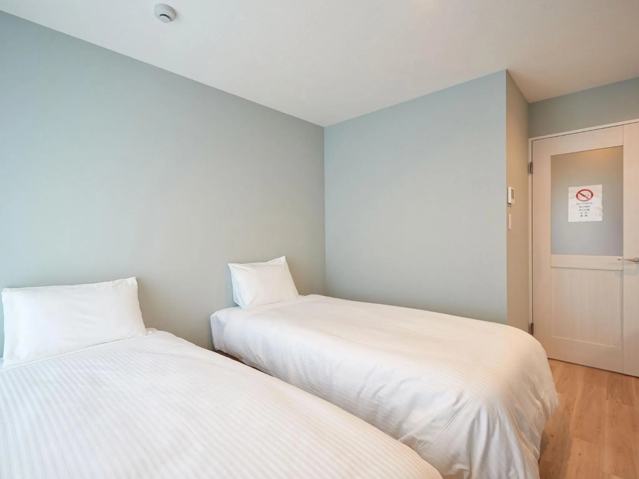 Photo of the whole room, Bed in Tenpoint Hotel OKOU