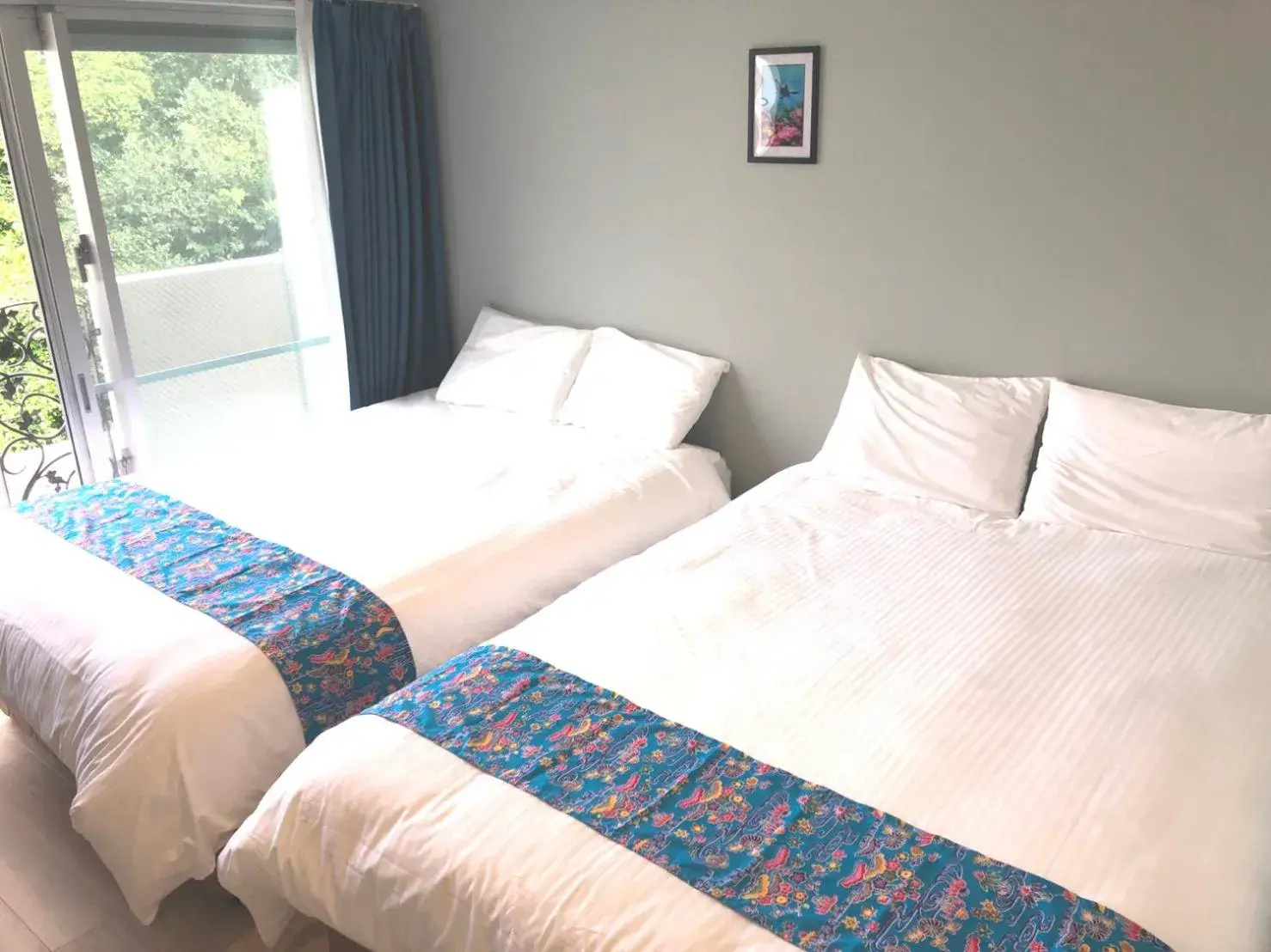 Bed in Tenpoint Hotel OKOU Bed in Tenpoint Hotel OKOU