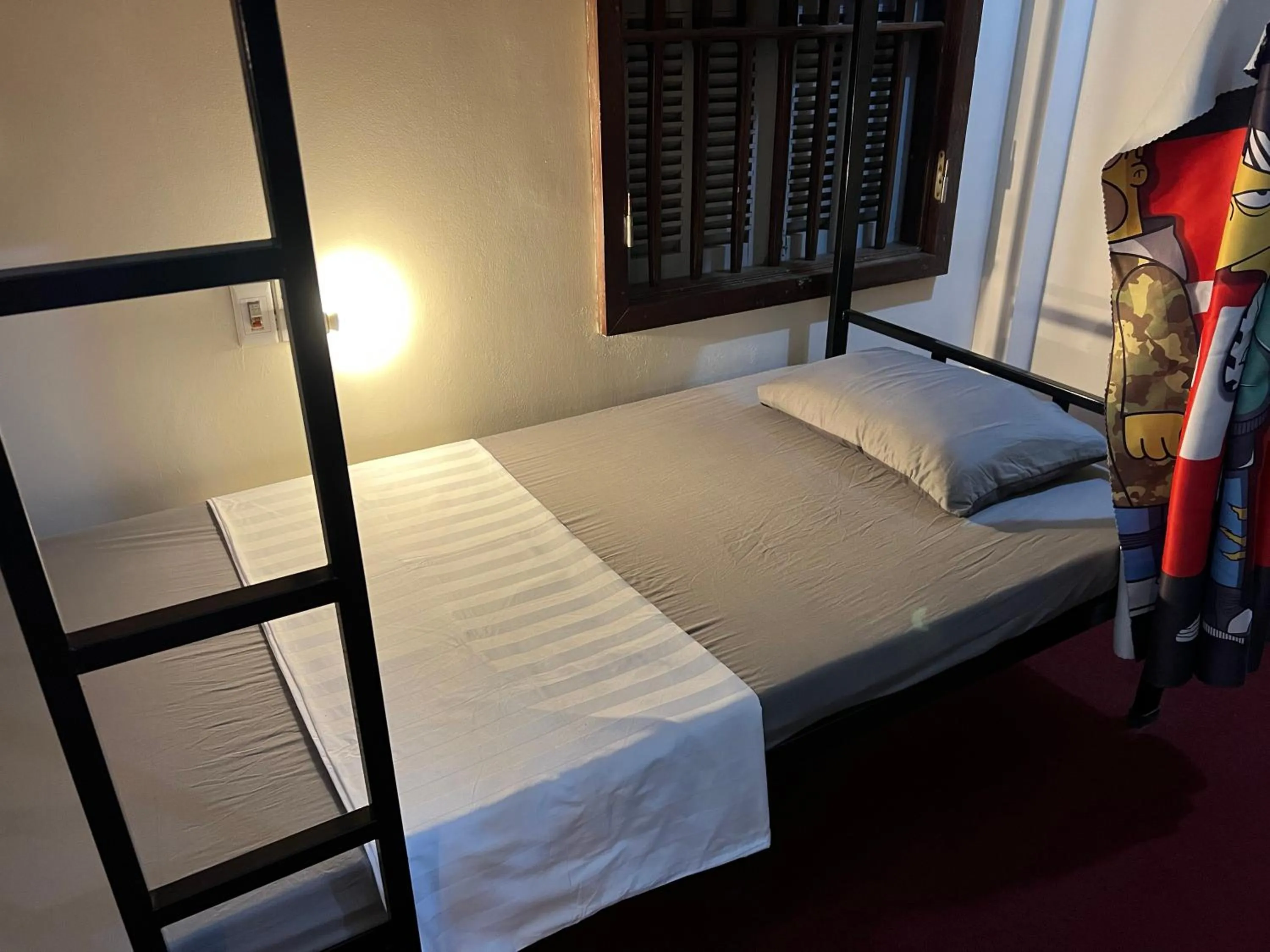 Bed in HG Hostel provide Tours & Motorbikes