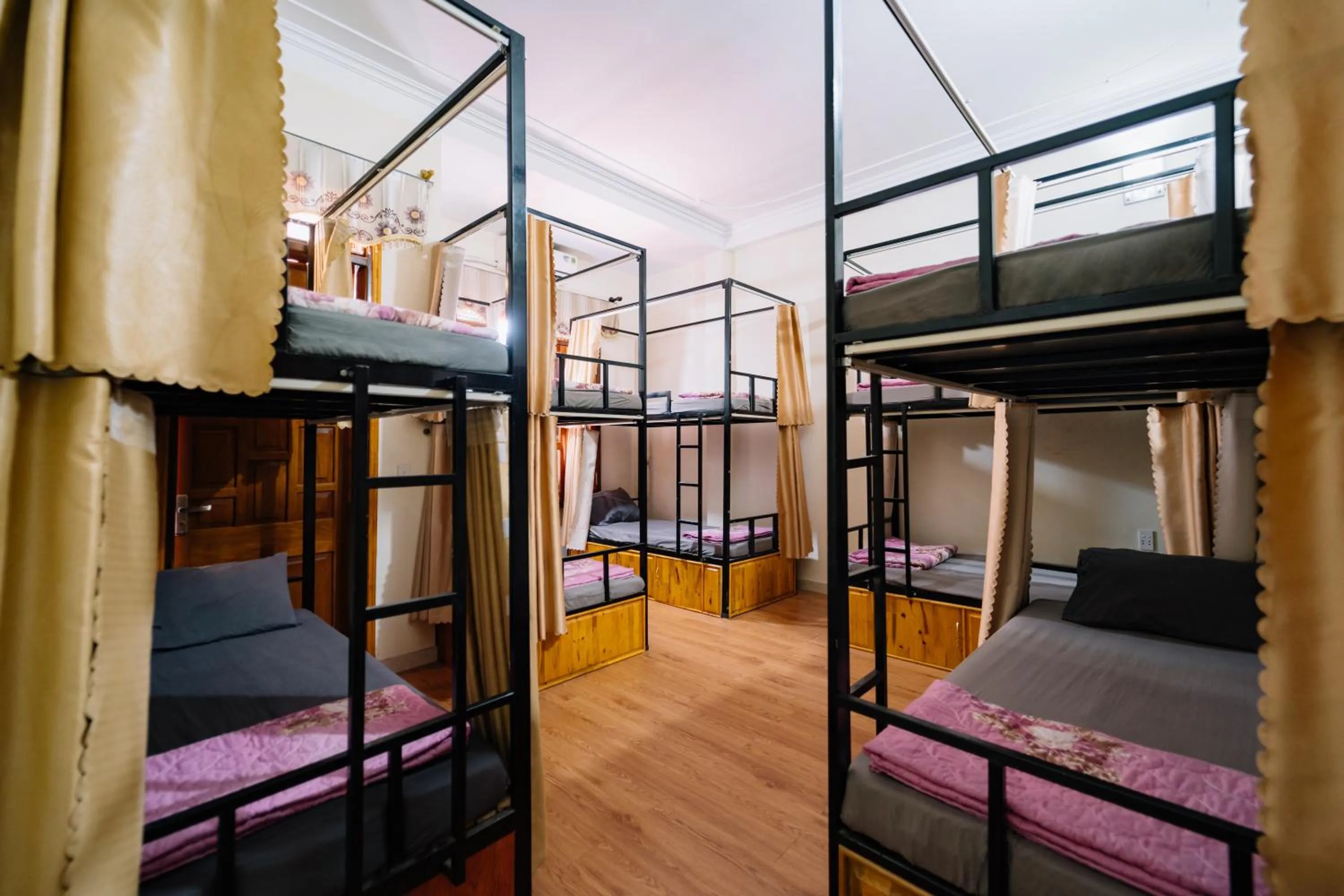 Photo of the whole room, Bed in HG Hostel provide Tours & Motorbikes