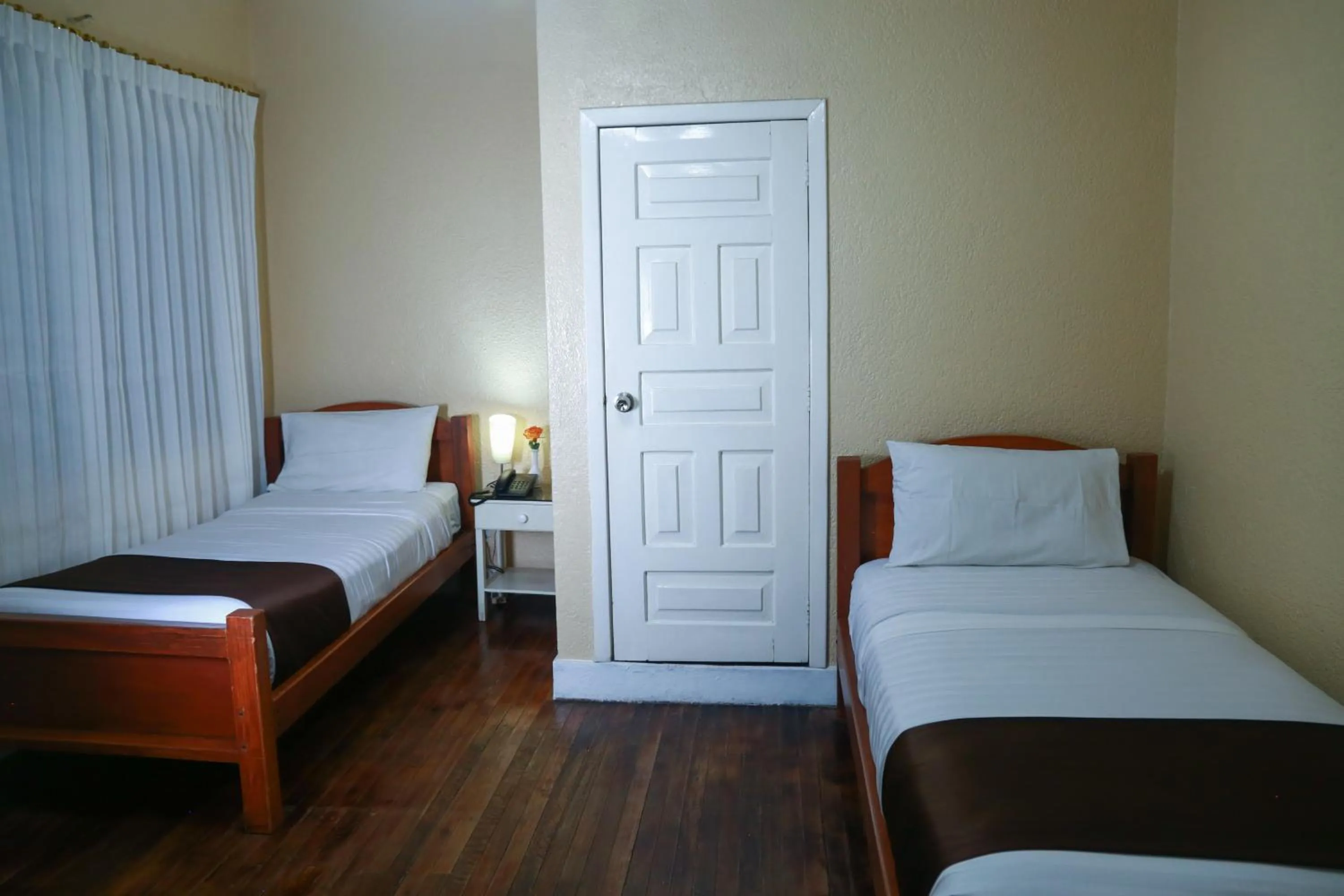 Bed in Hostal Loro Verde