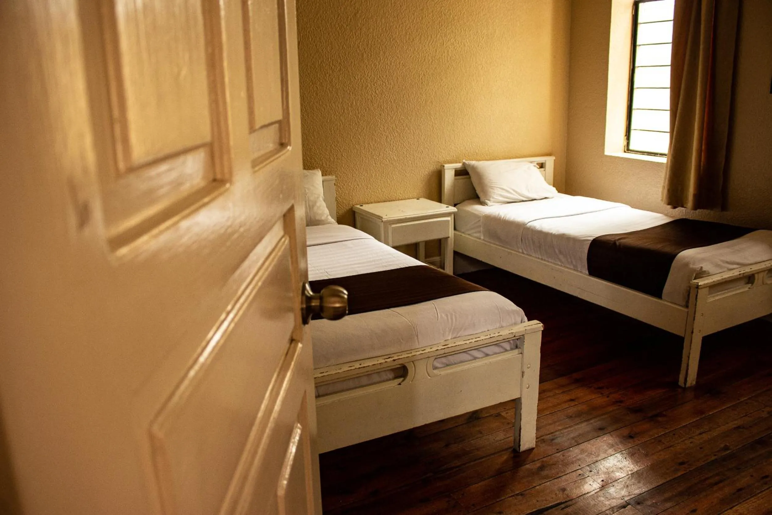 Bed in Hostal Loro Verde