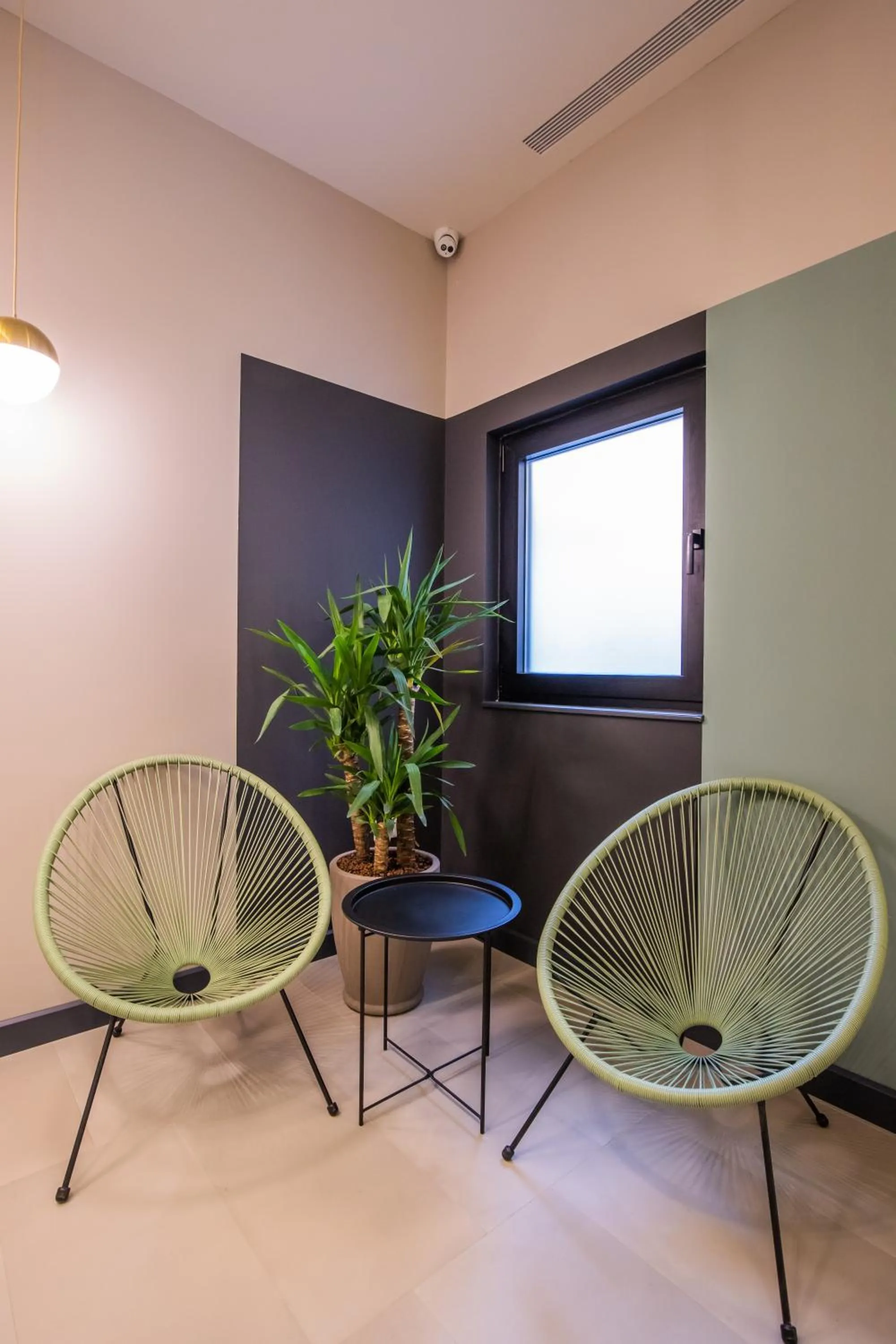 Seating area in Allure Boutique Hotel