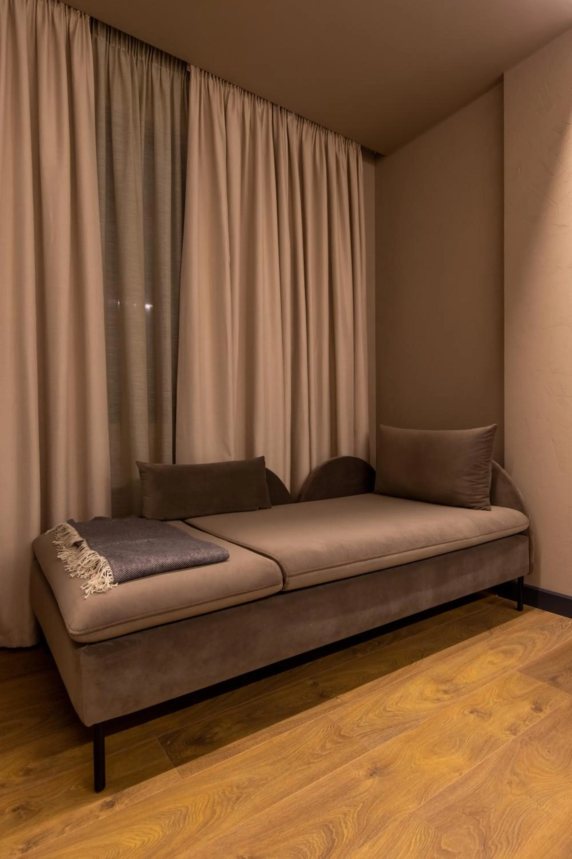 Seating area, Bed in Allure Boutique Hotel