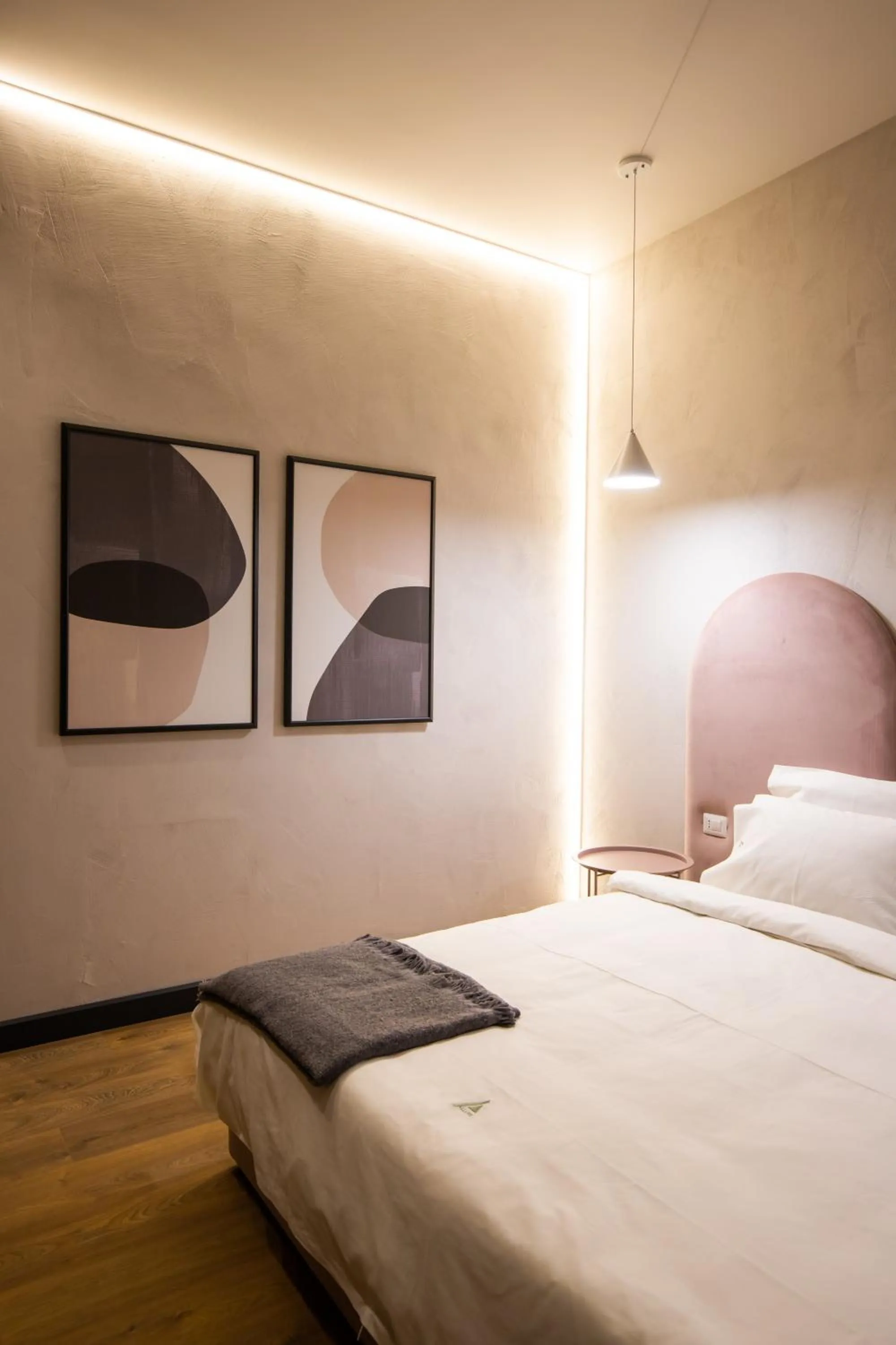 Bed in Allure Boutique Hotel