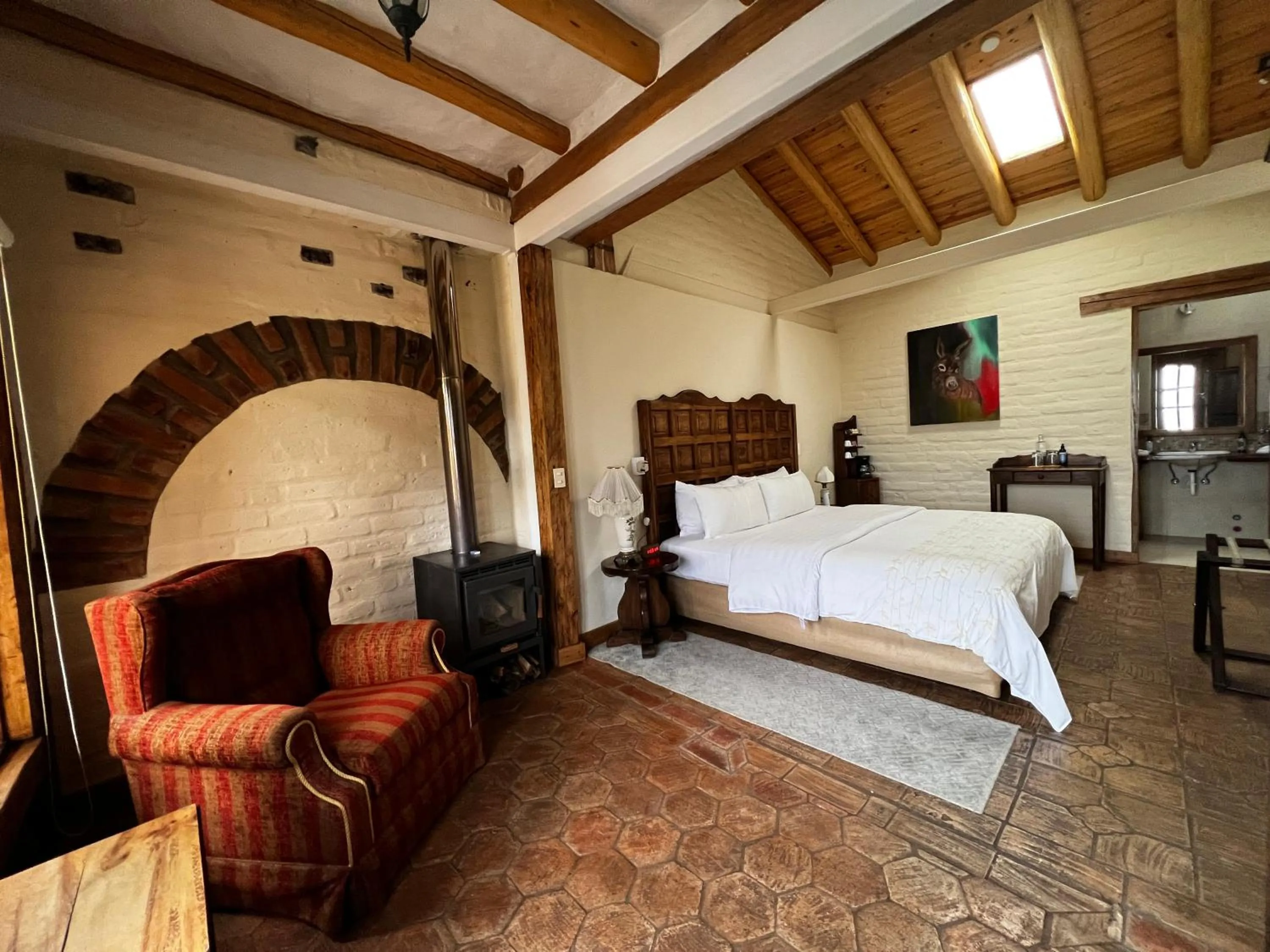 Living room, Bed in Hacienda Jimenita Wildlife Reserve