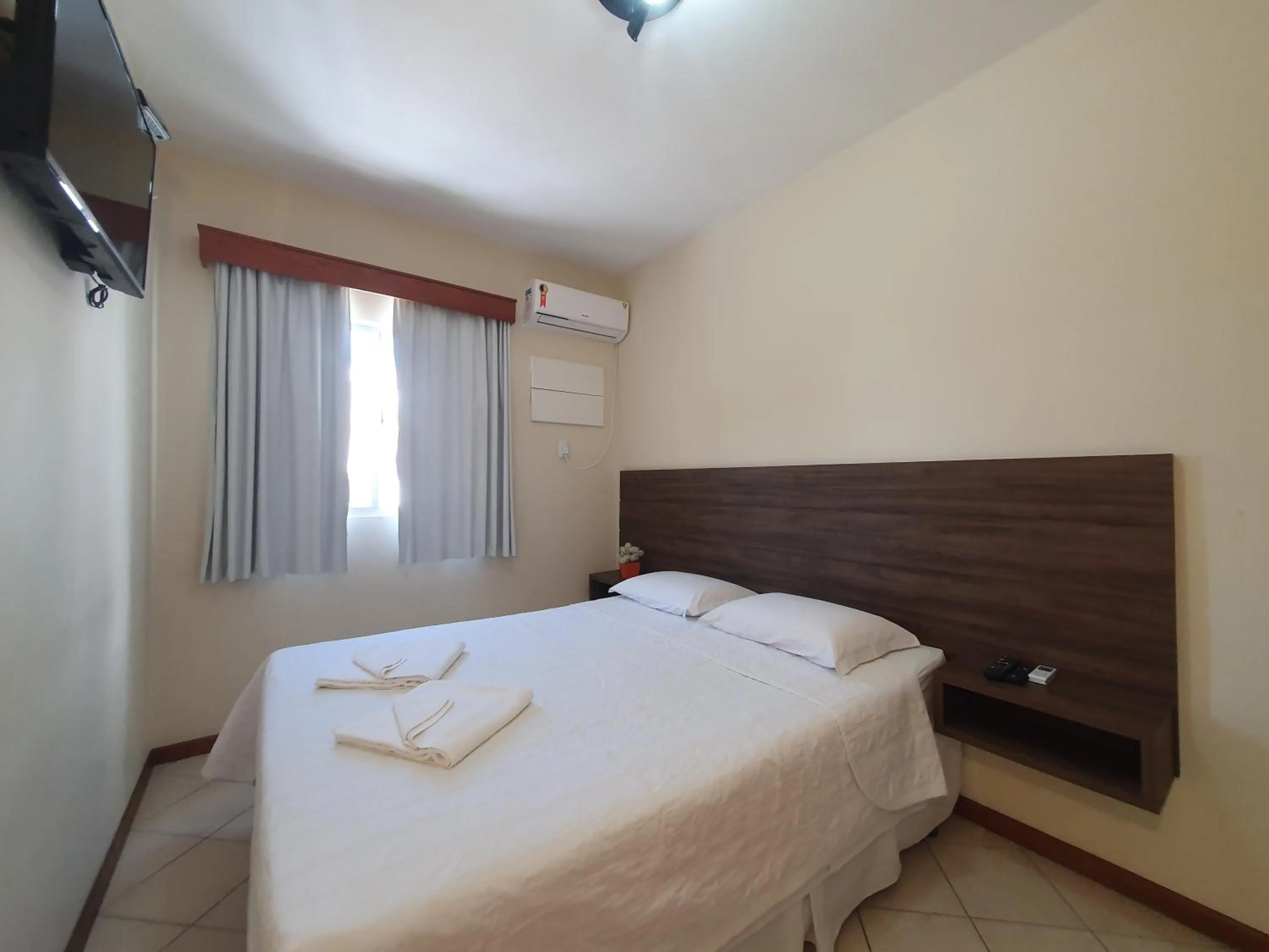 Bed in Pousada Acapulco - Bombinhas