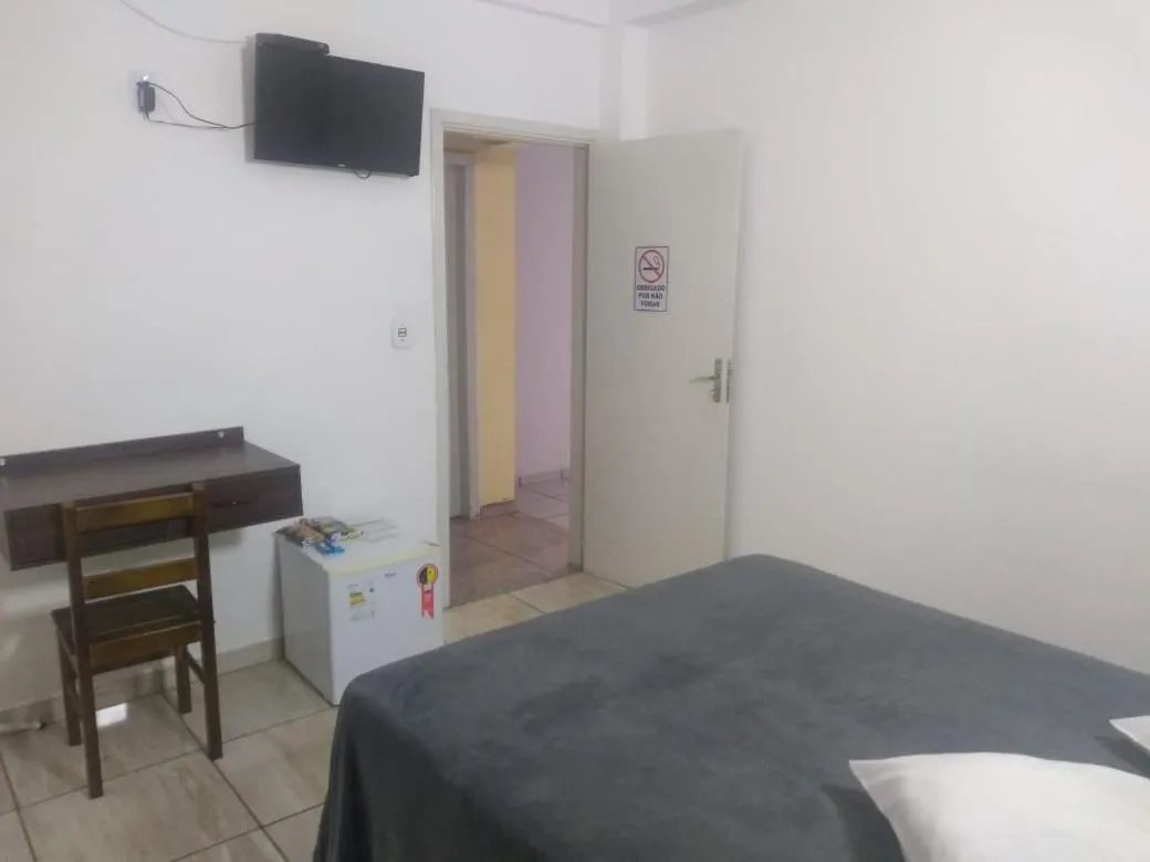 Communal lounge/ TV room, Bed in Hotel Iguaçu