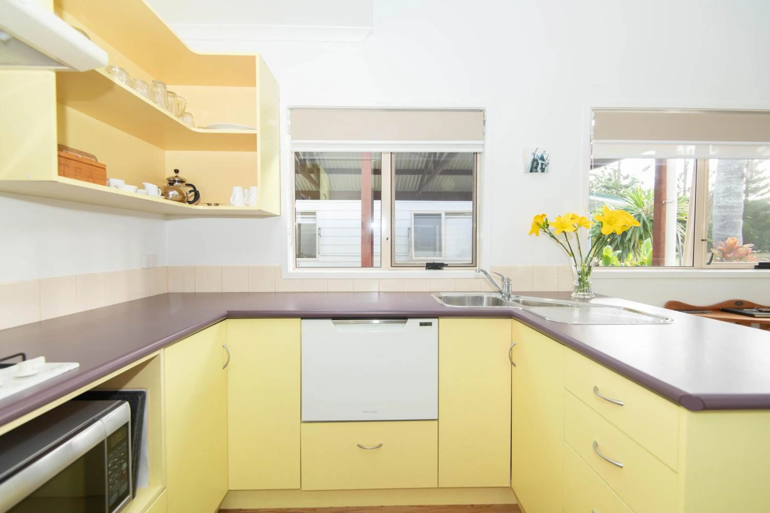 kitchen in Poinciana Cottages