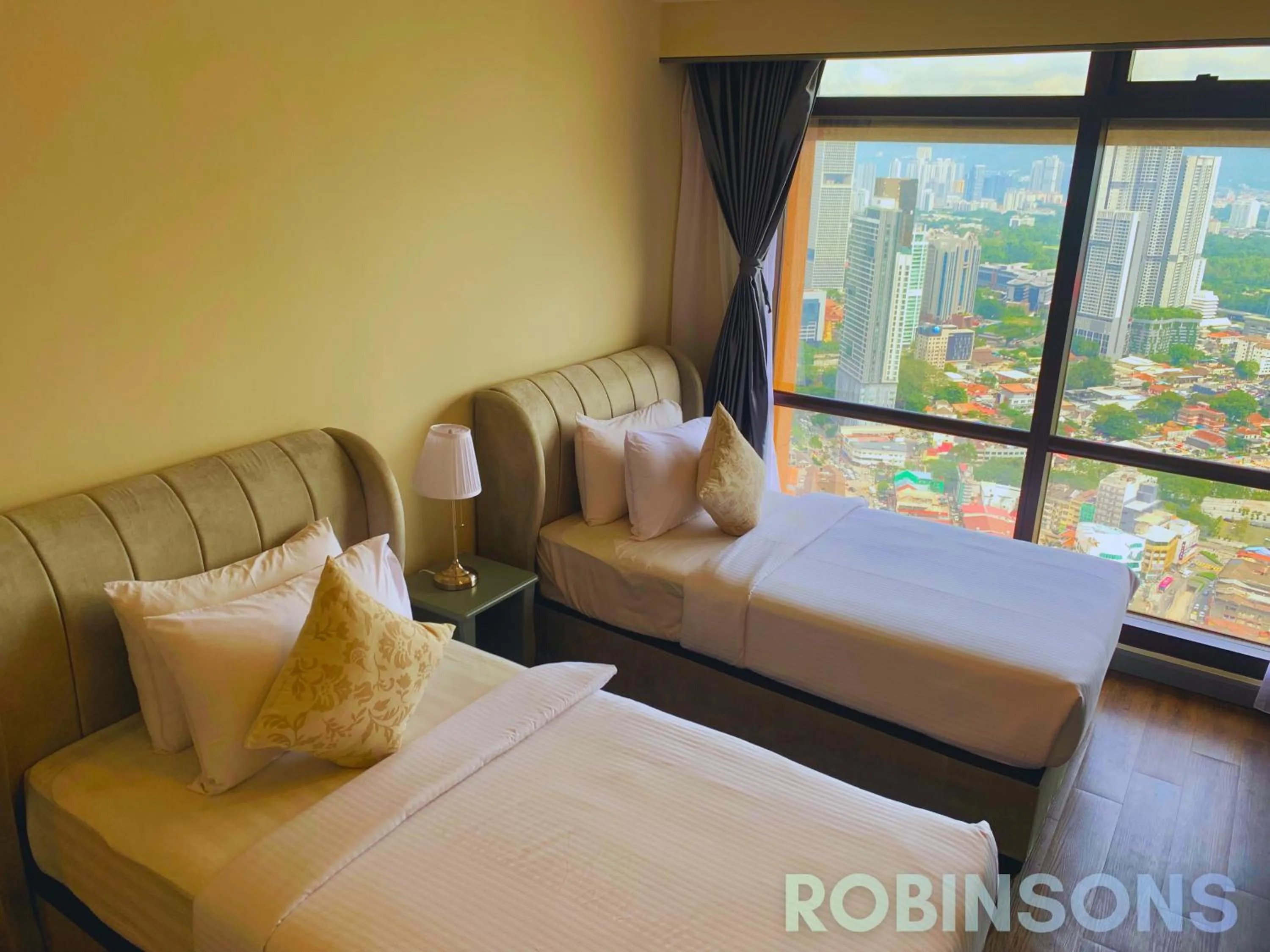 Bed in Serviced Apartments at Times Square Kuala Lumpur by Robinsons