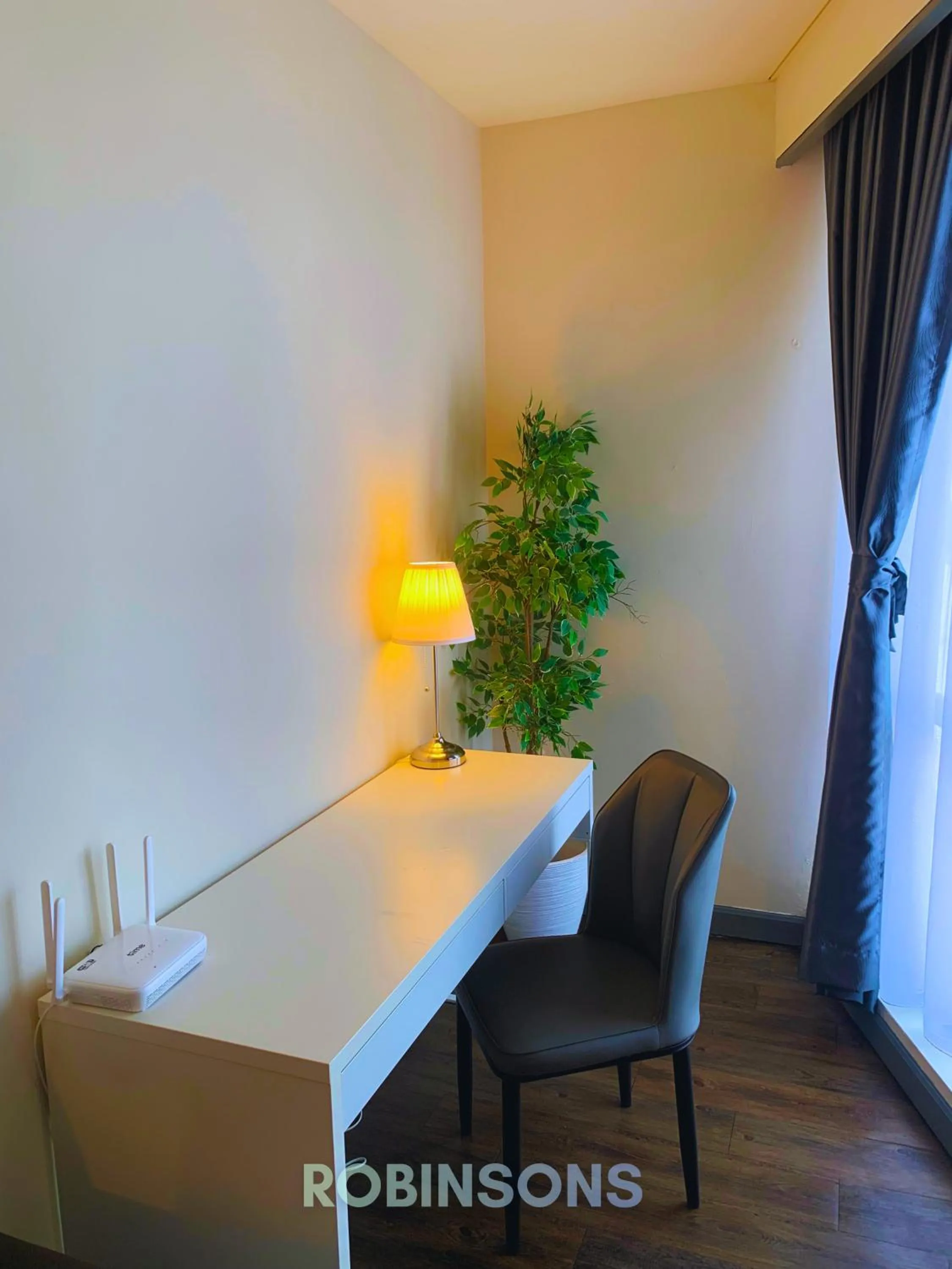 Seating area in Serviced Apartments at Times Square Kuala Lumpur by Robinsons