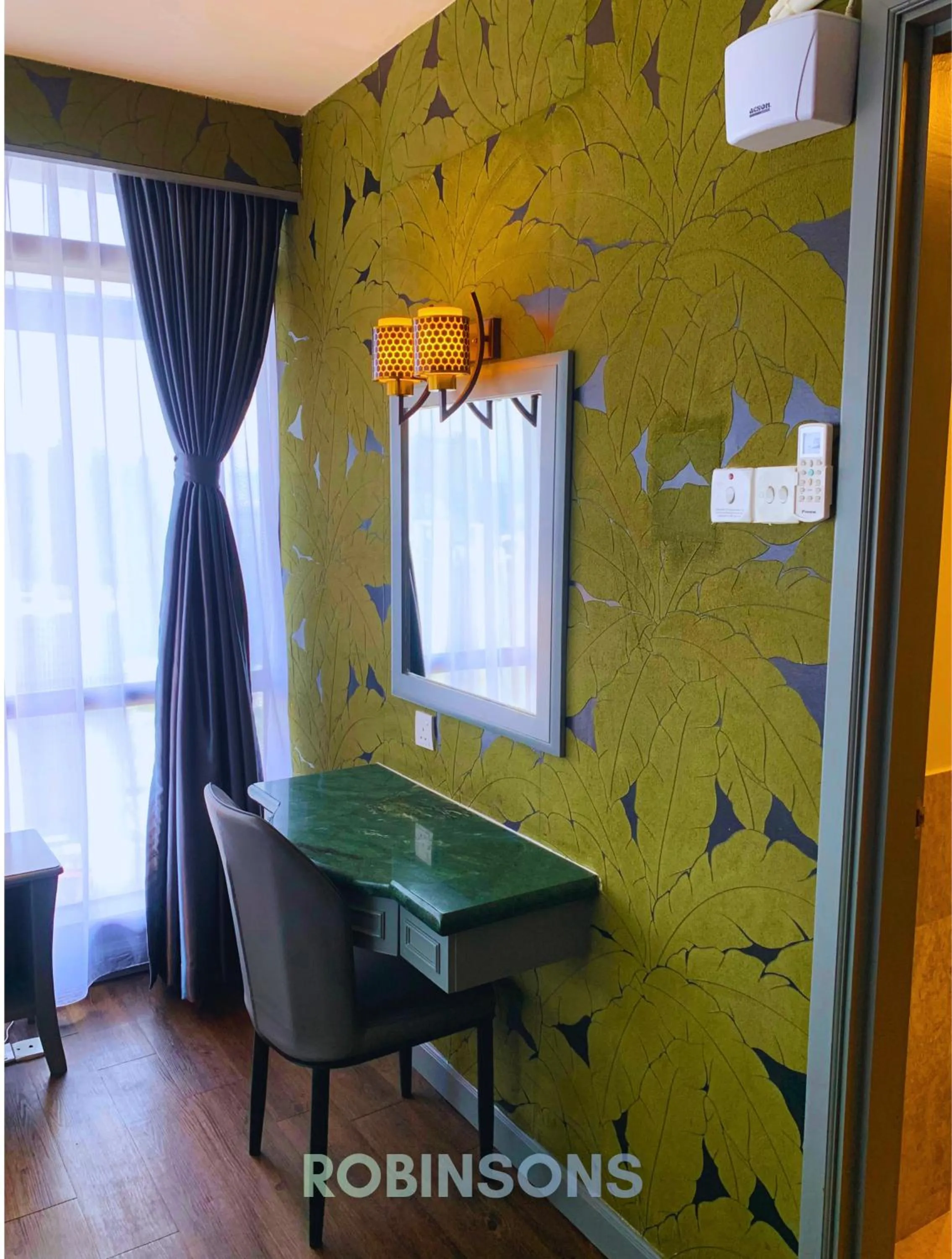 Seating area in Serviced Apartments at Times Square Kuala Lumpur by Robinsons