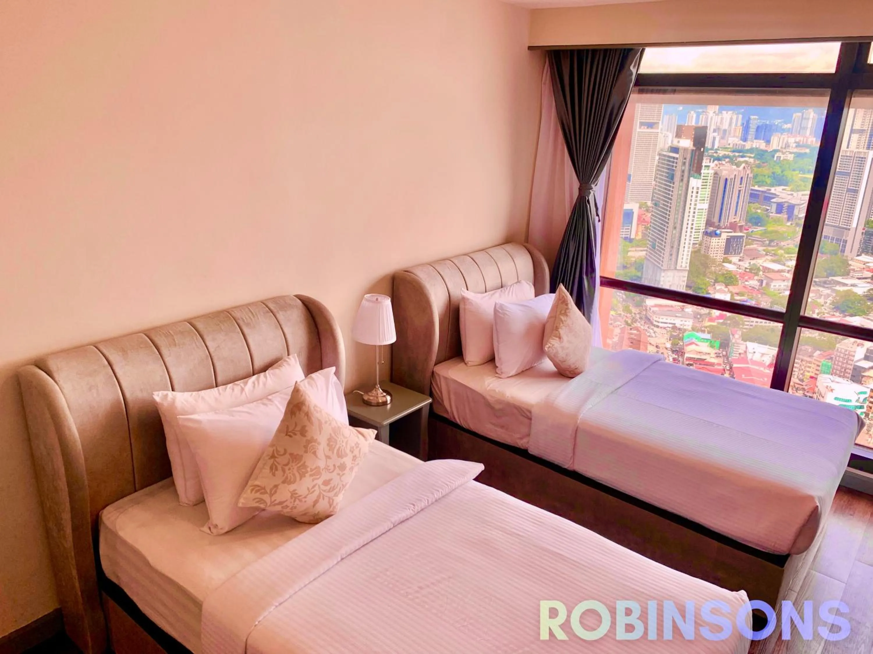 Bed in Serviced Apartments at Times Square Kuala Lumpur by Robinsons