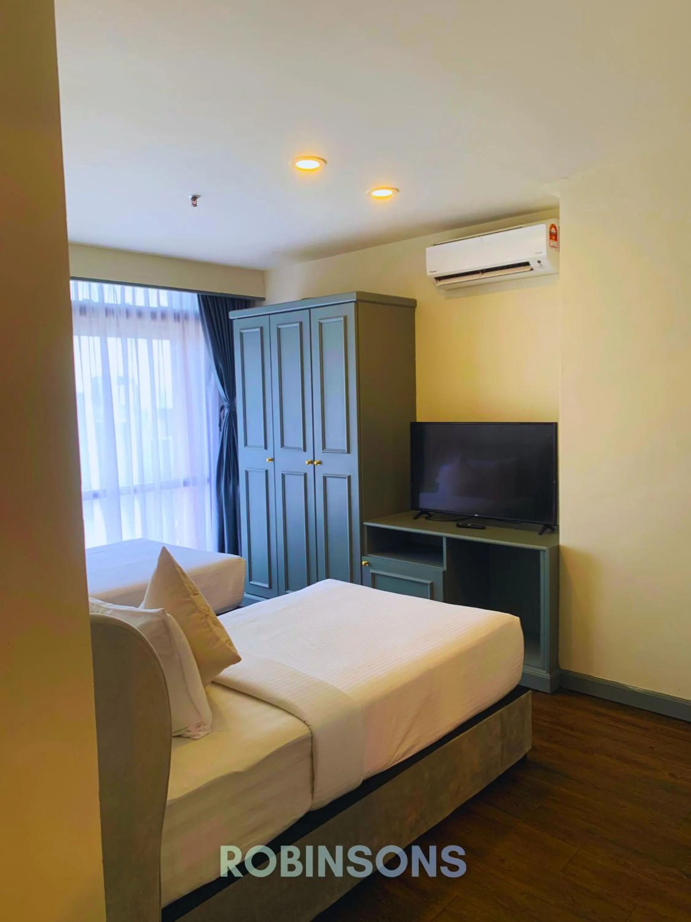 Bed in Serviced Apartments at Times Square Kuala Lumpur by Robinsons