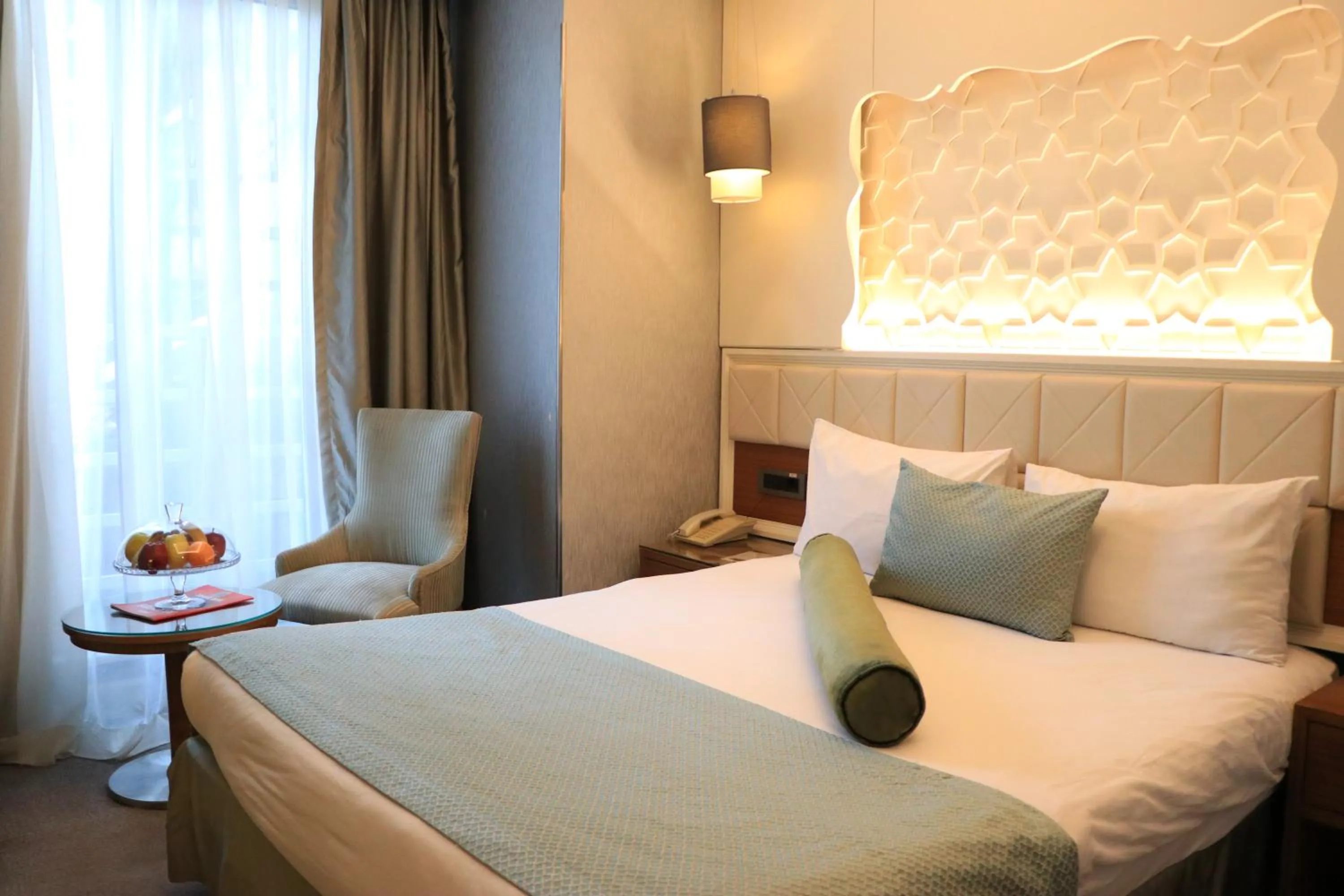 Bed in Grand Star Hotel Premium