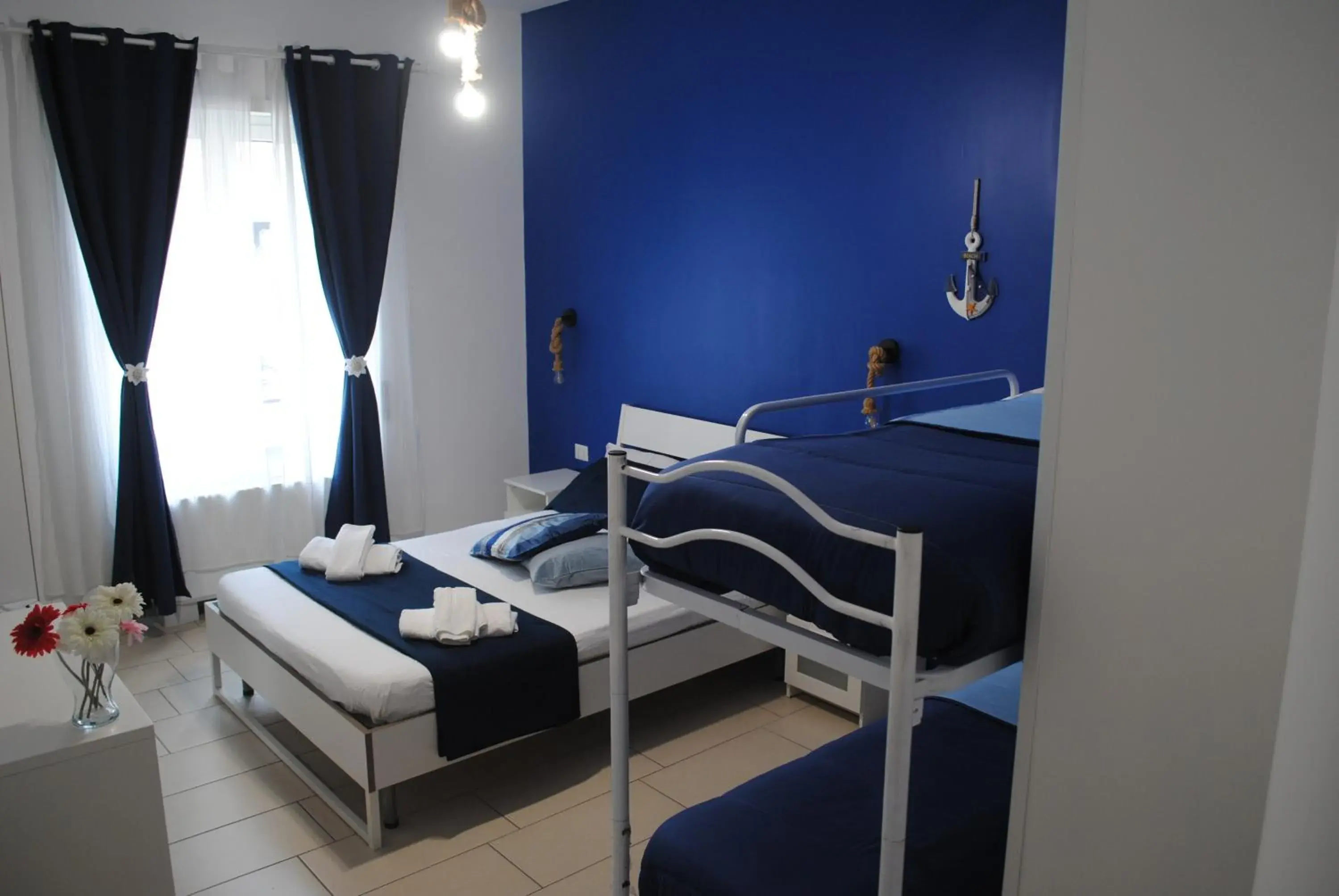 Triple Room in Molo 5 Triple Room in Molo 5