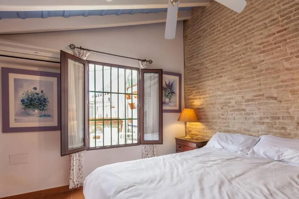 Bed in PuraSevilla apartments