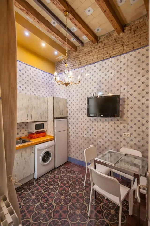 Kitchen or kitchenette in PuraSevilla apartments