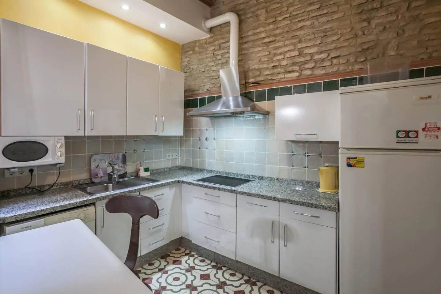 Kitchen or kitchenette in PuraSevilla apartments