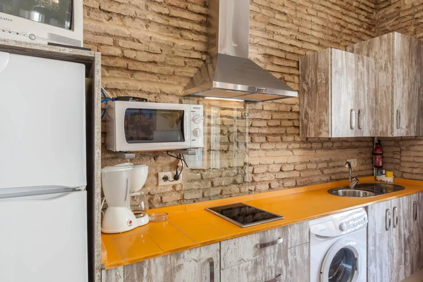 Kitchen or kitchenette in PuraSevilla apartments