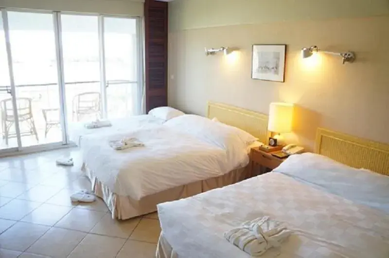 Bed in Palau Royal Resort Bed in Palau Royal Resort