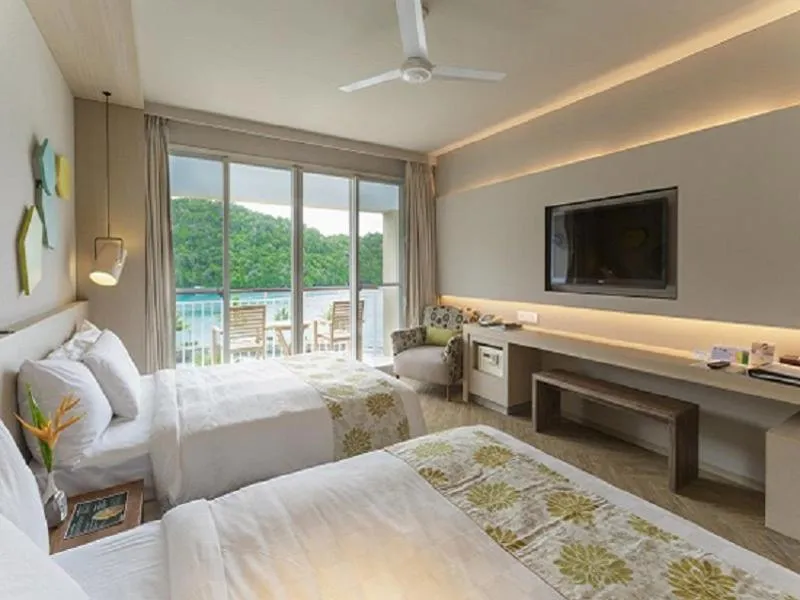 Bed in Palau Royal Resort