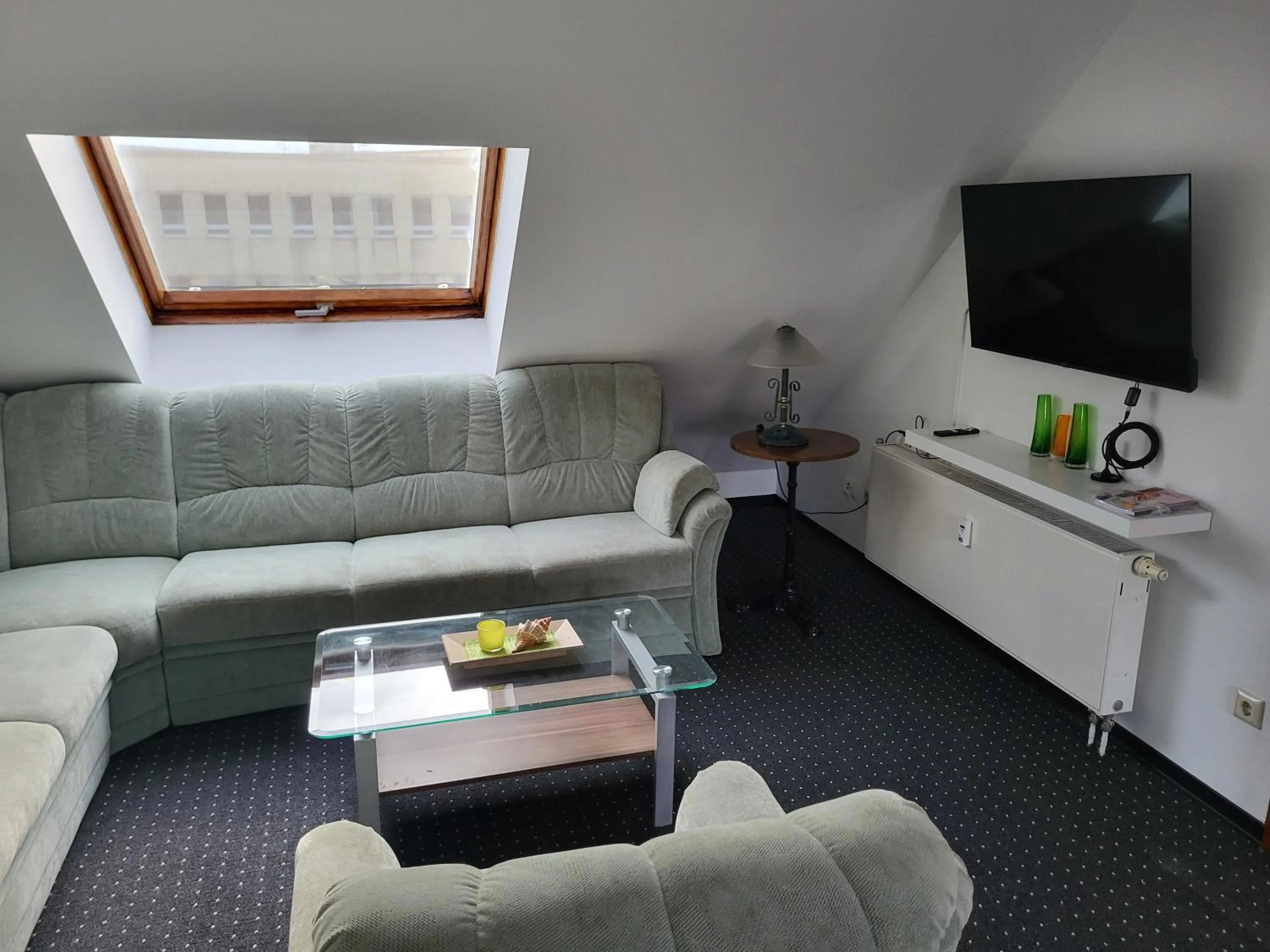 Communal lounge/ TV room in Albergo City Hotel Berlin