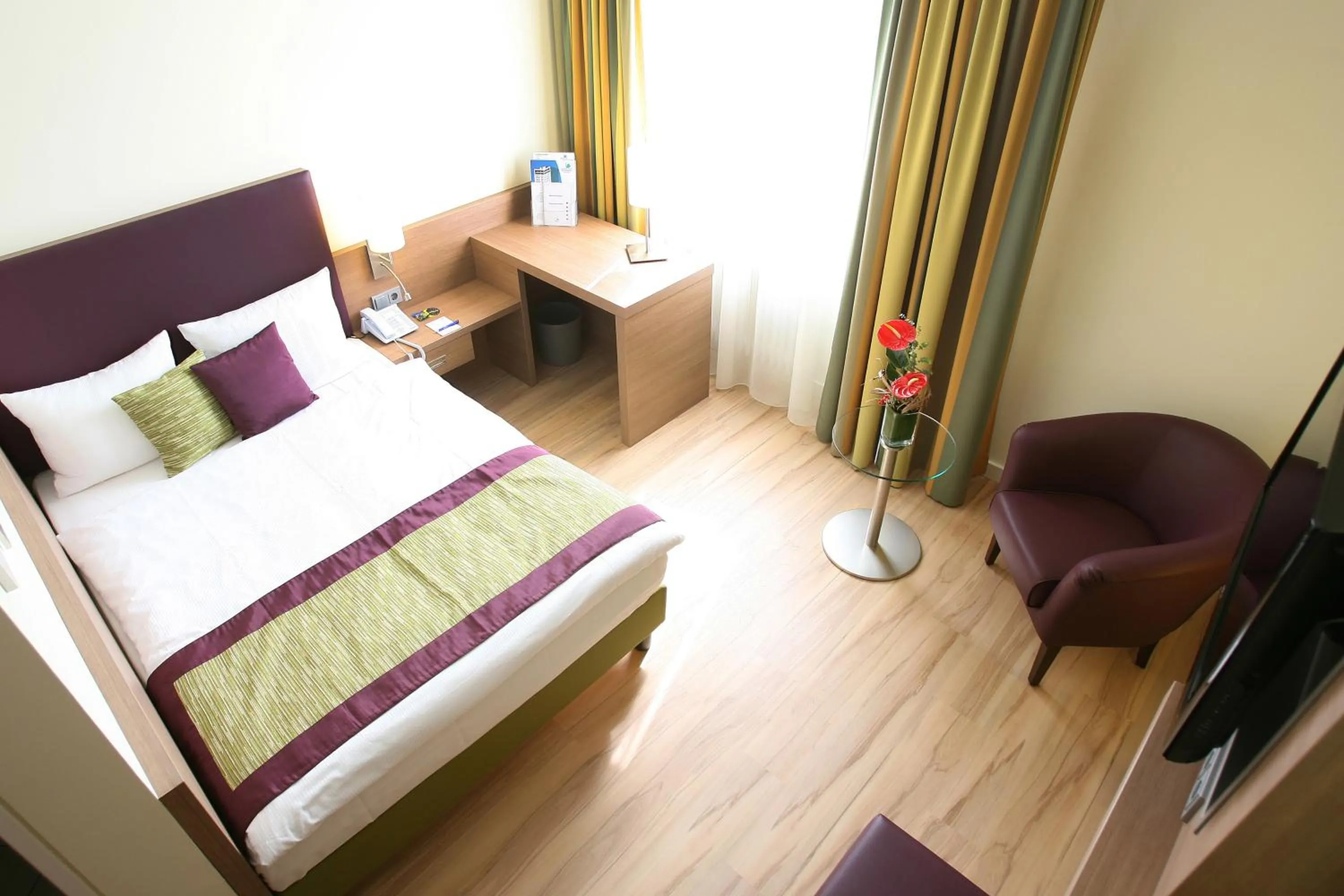 Photo of the whole room, Bed in Congress Hotel am Stadtpark