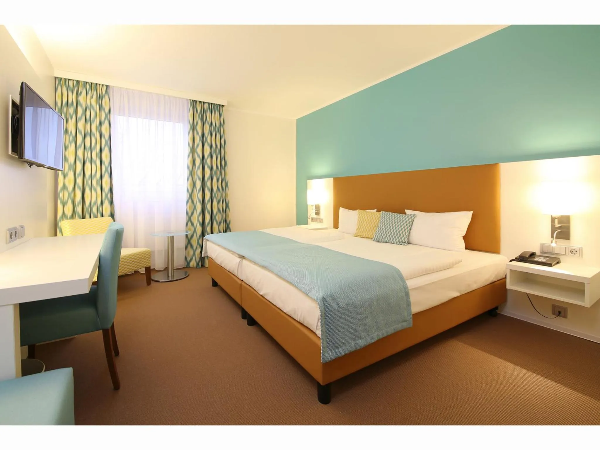 Photo of the whole room, Bed in Congress Hotel am Stadtpark