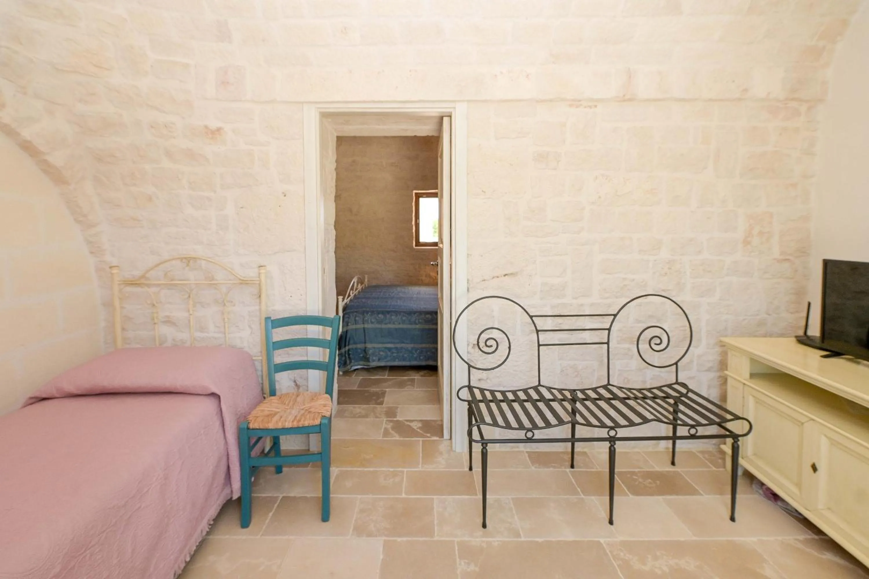 Seating area, Bed in Resort Masseria Cecato