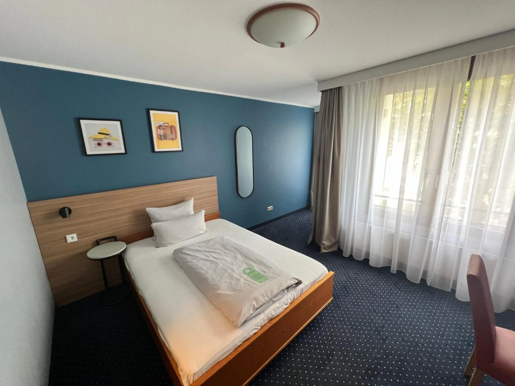 Photo of the whole room, Bed in Garner Hotel Bochum by IHG