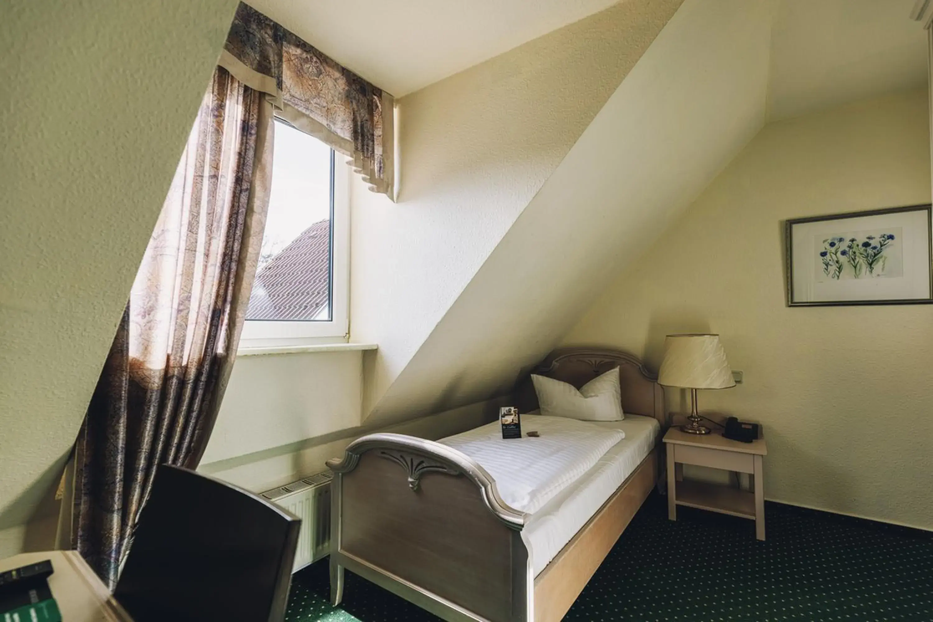 Bed in Seehotel Heidehof Bed in Seehotel Heidehof