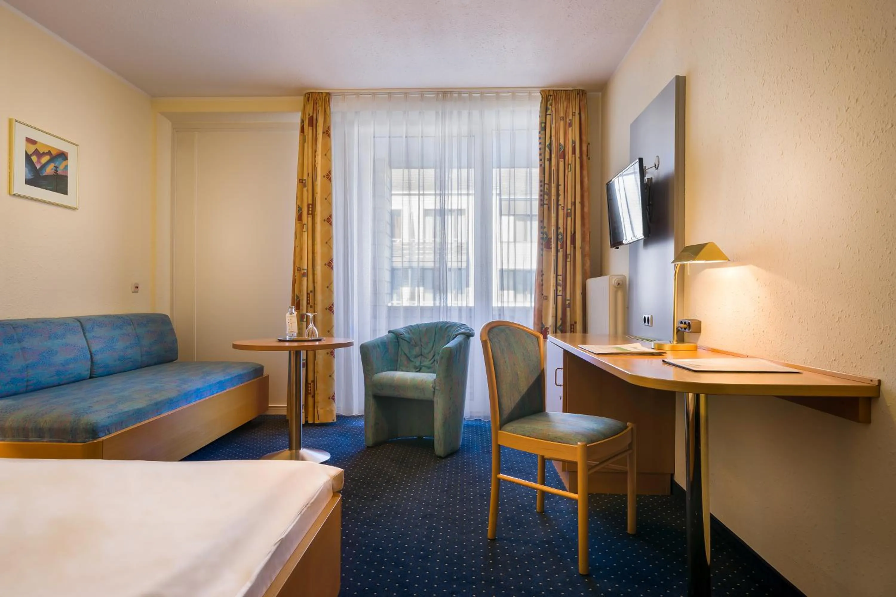 Photo of the whole room in acora Bonn Living the City