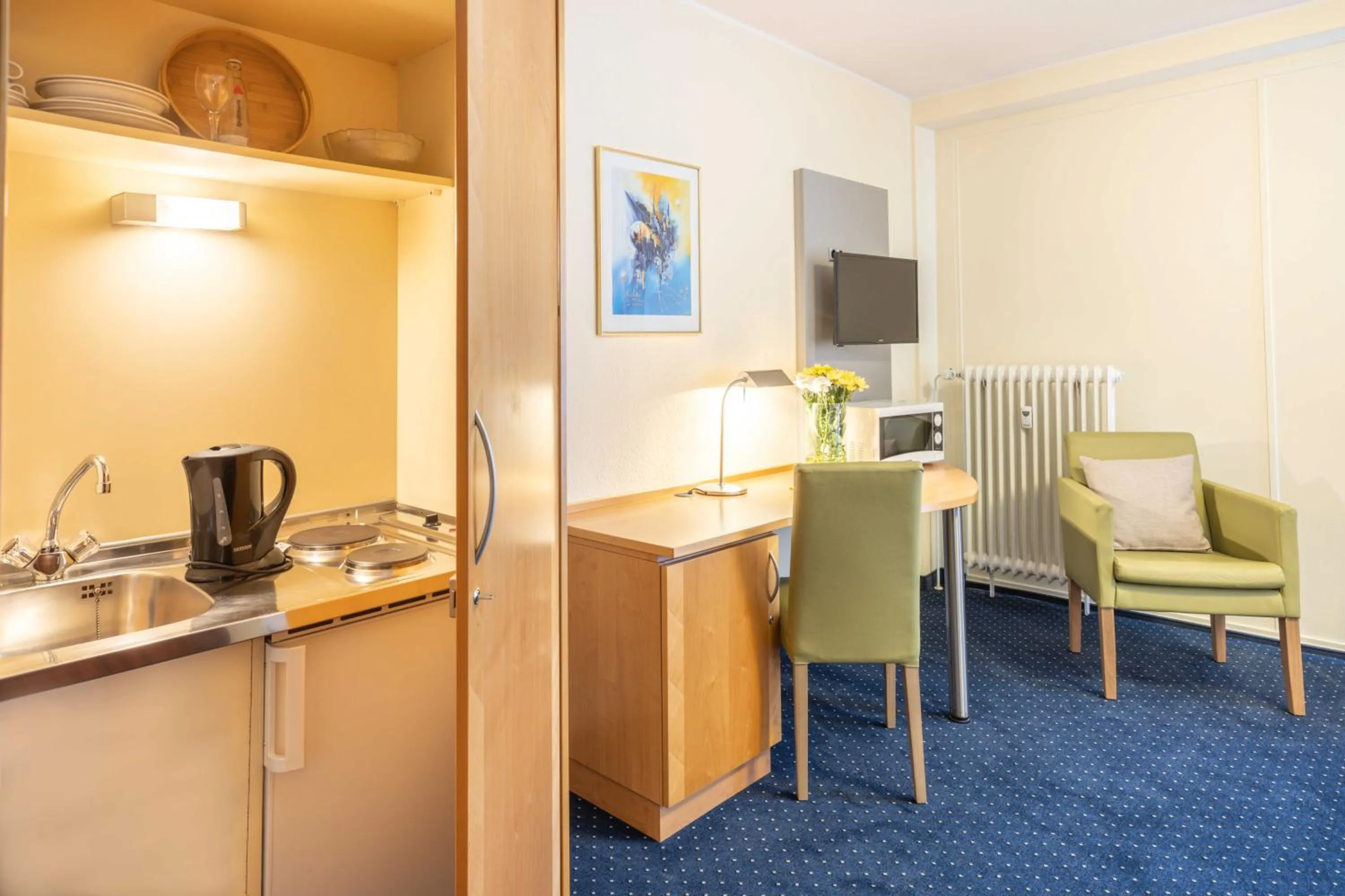 Kitchen or kitchenette in acora Bonn Living the City