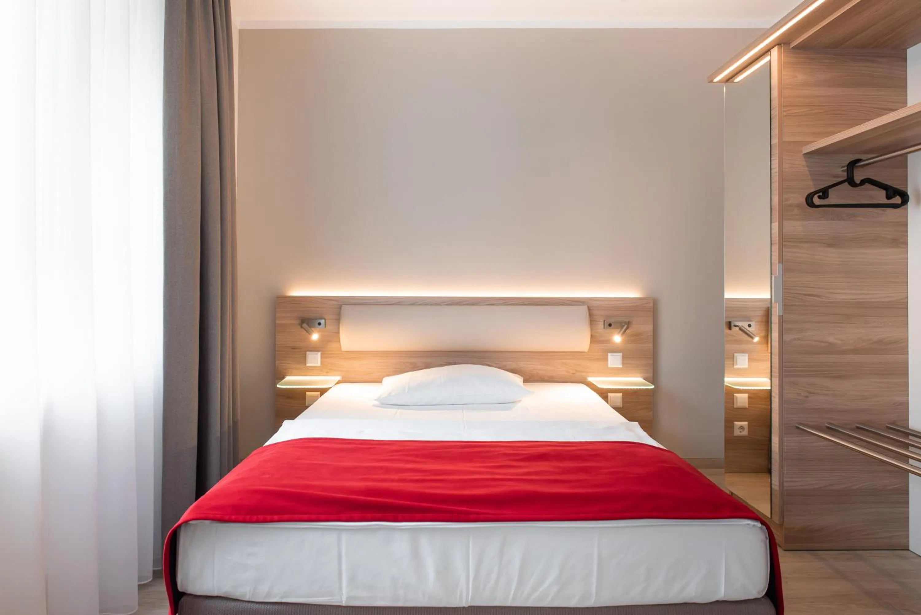 Bed in Hotel Königshof am Funkturm