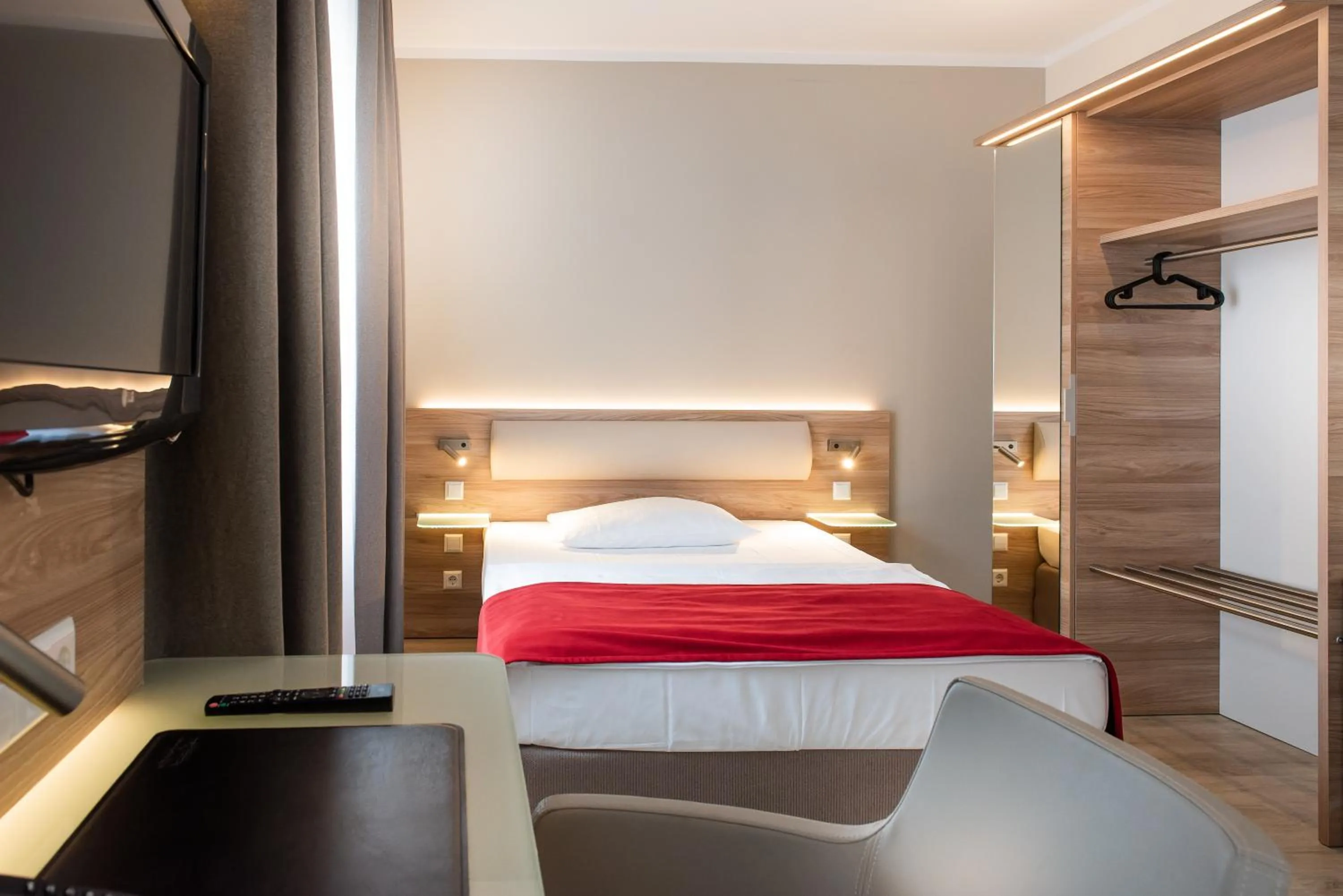 Bed in Hotel Königshof am Funkturm