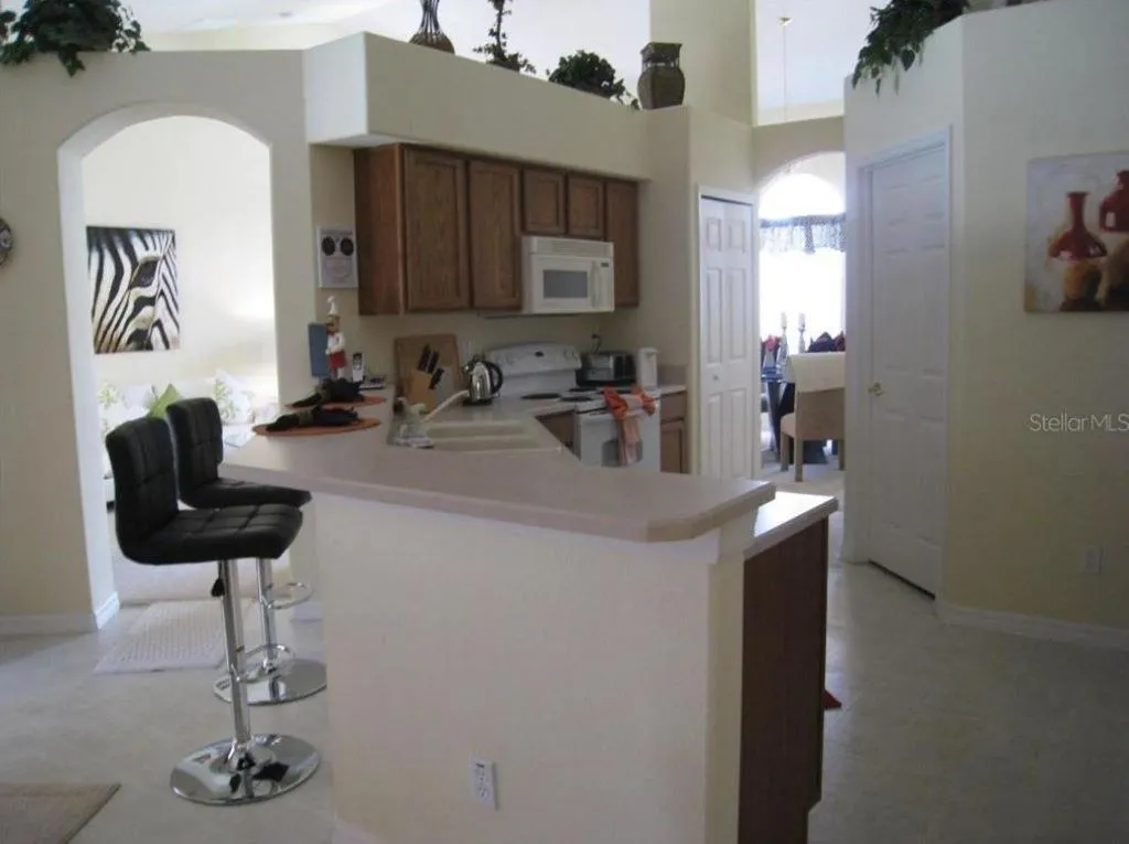 Kitchen or kitchenette in Family Vacation Home With Pool and Spa Near Disney and Universal
