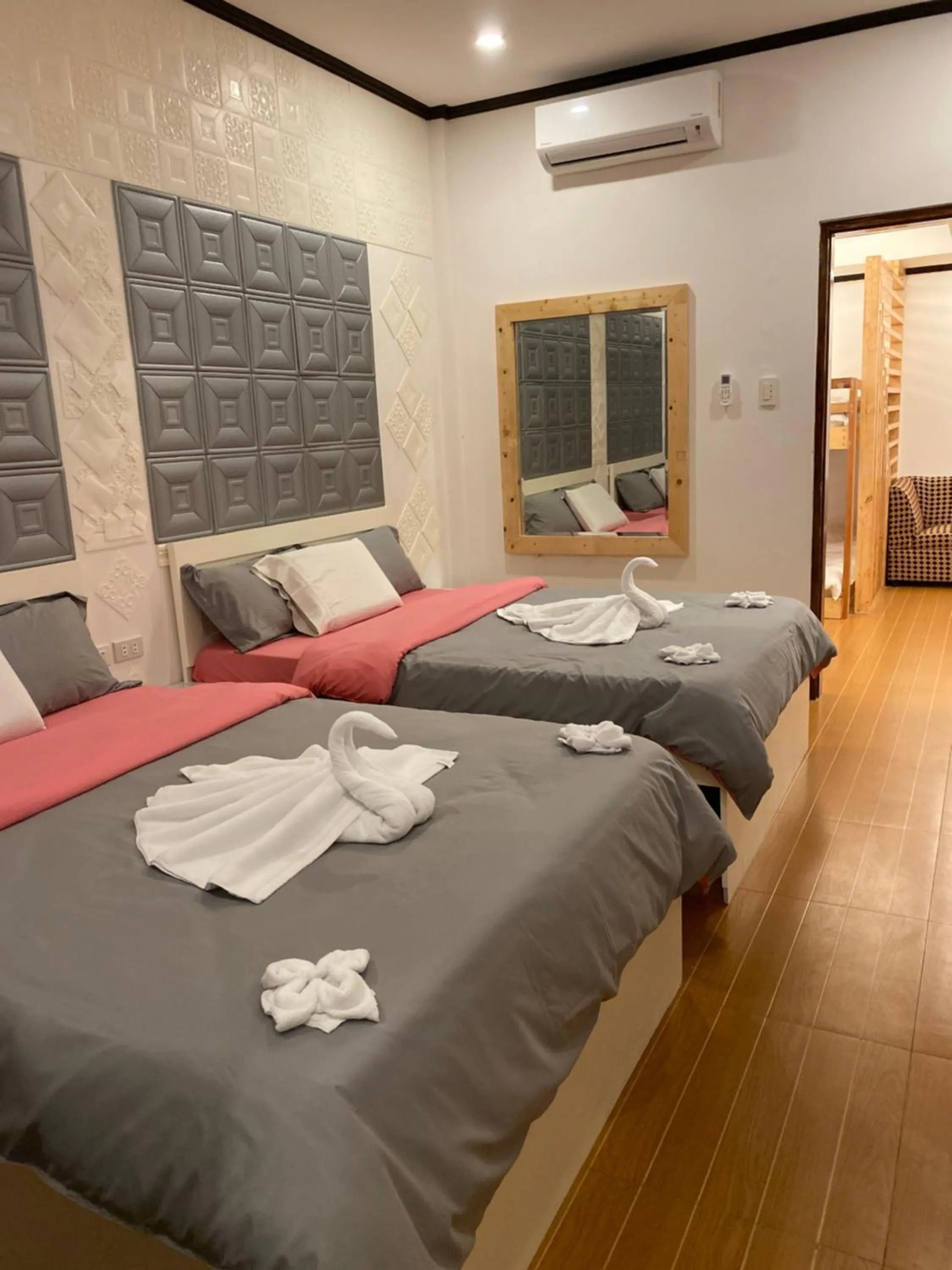 Bed in Monallan Boracay Hotel