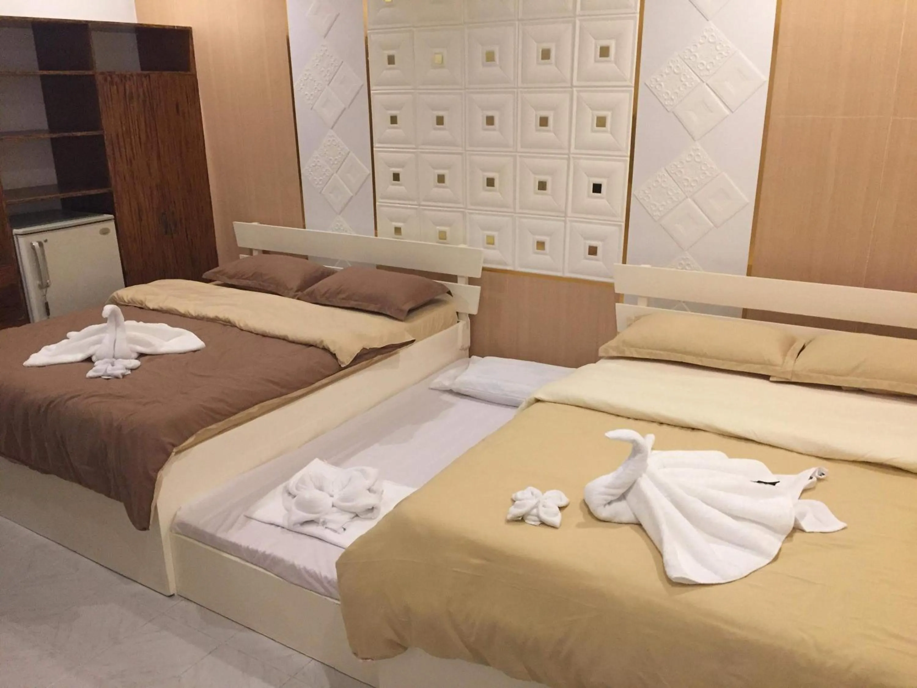 Bed in Monallan Boracay Hotel