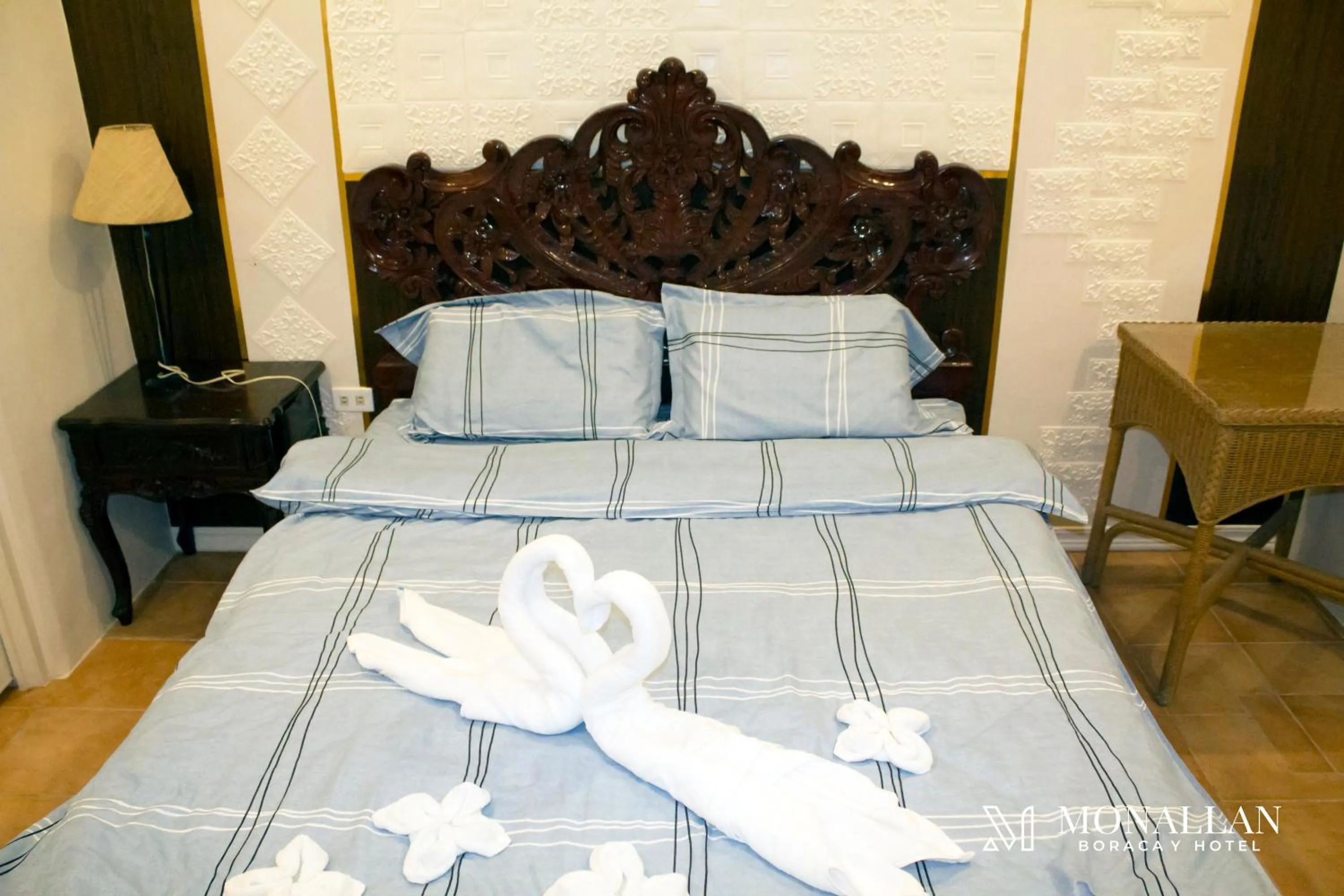 Bed in Monallan Boracay Hotel