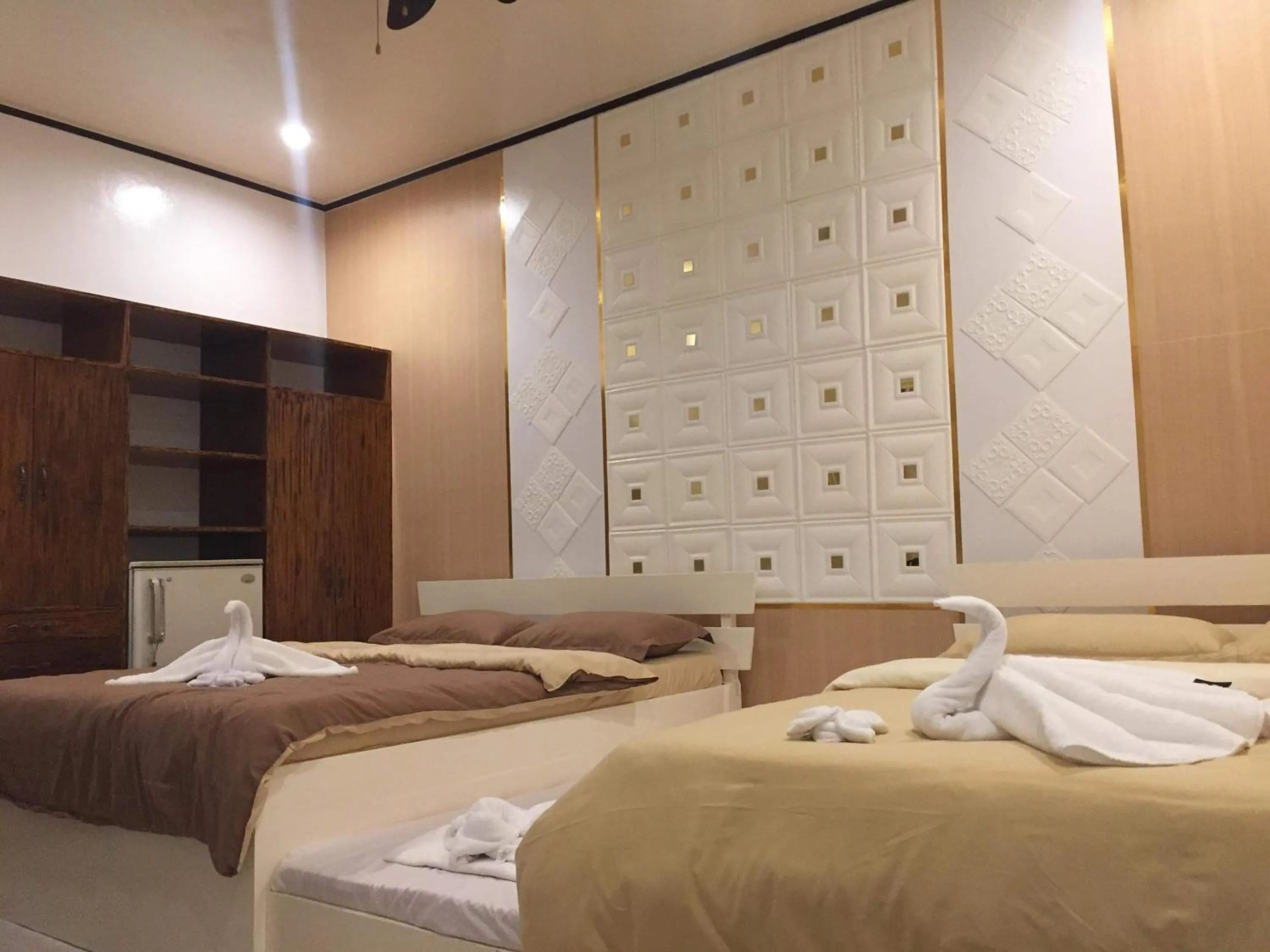 Bed in Monallan Boracay Hotel