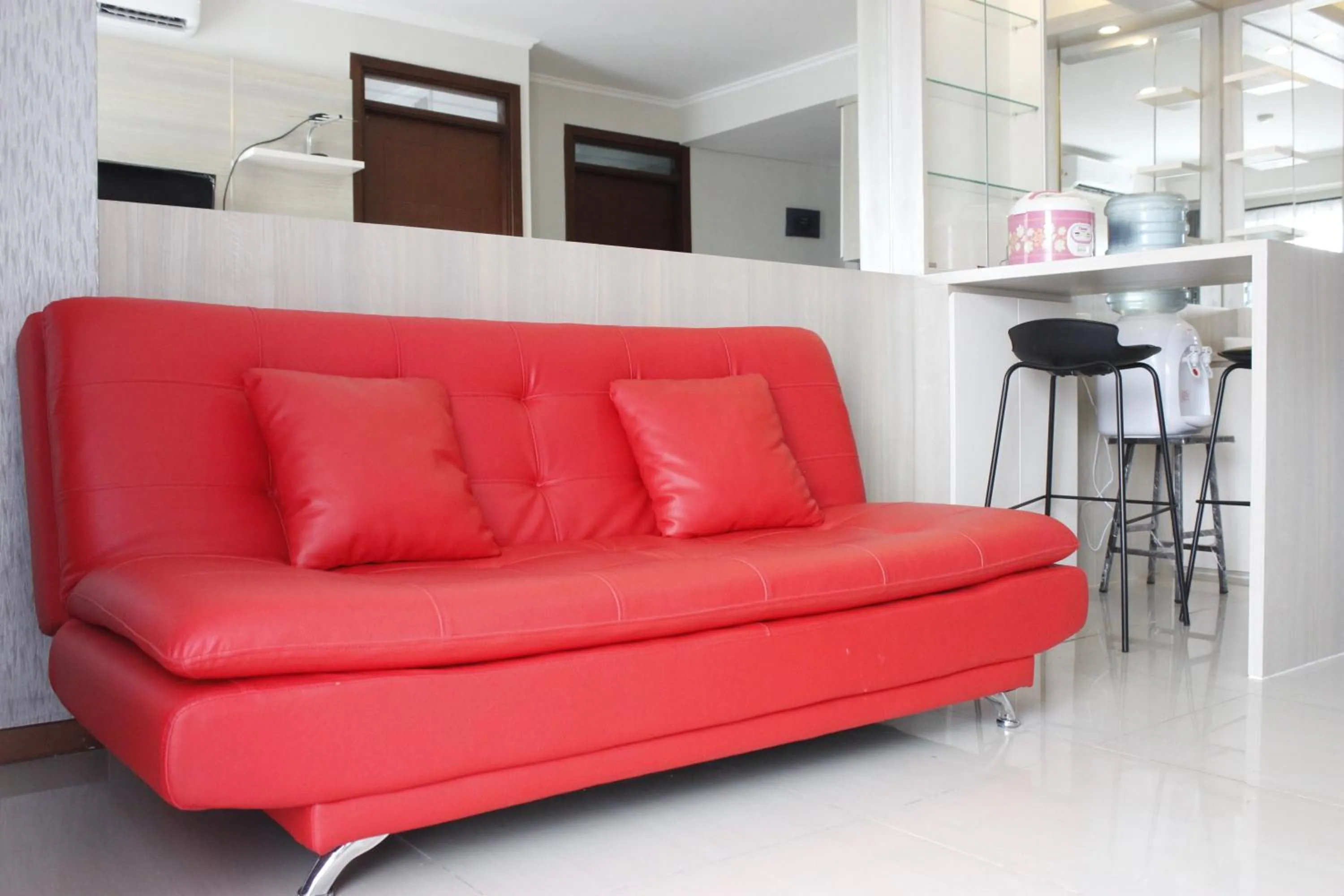 Bright and Stylish 2BR at Gateway Pasteur Apartment By Travelio