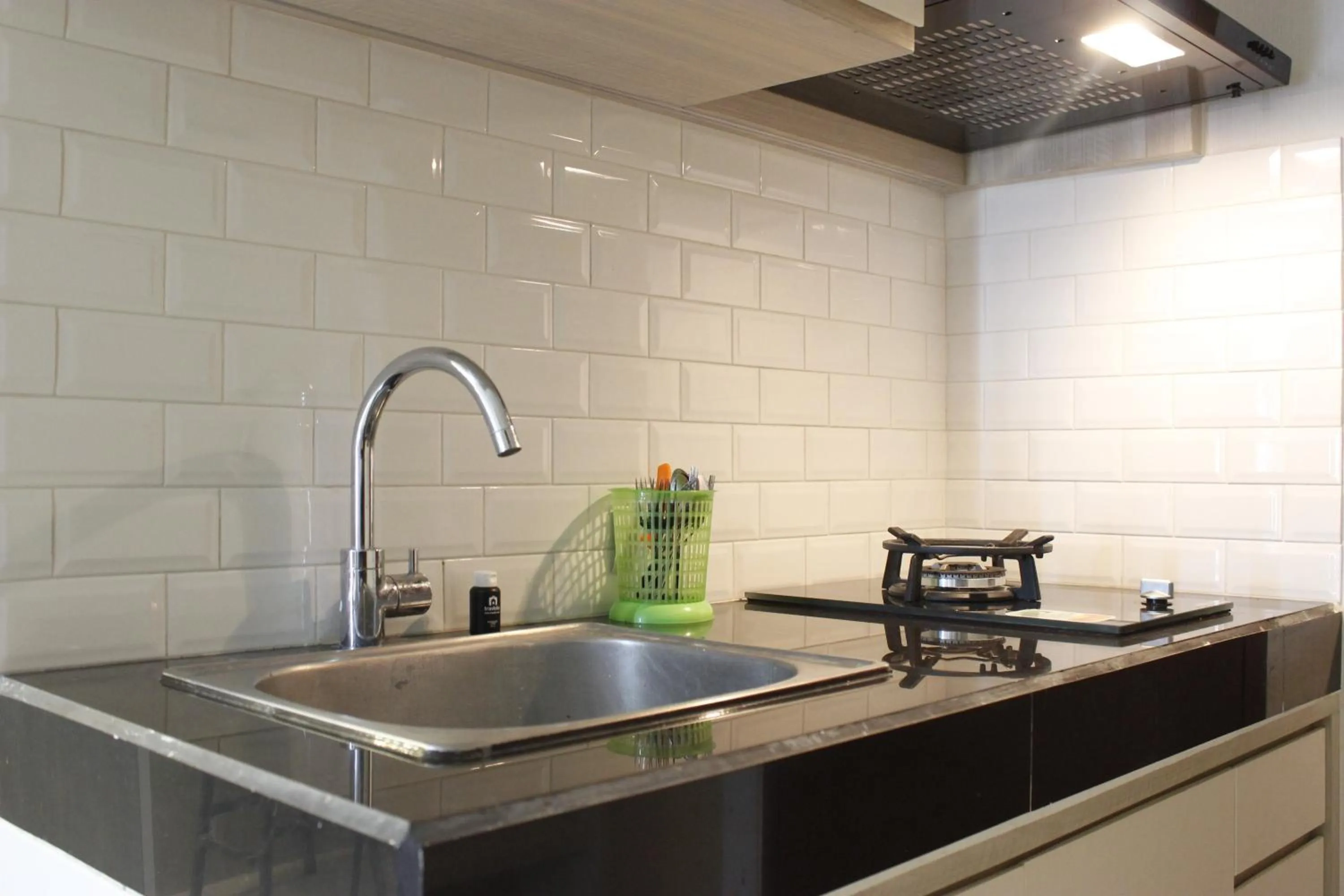 Bright and Stylish 2BR at Gateway Pasteur Apartment By Travelio