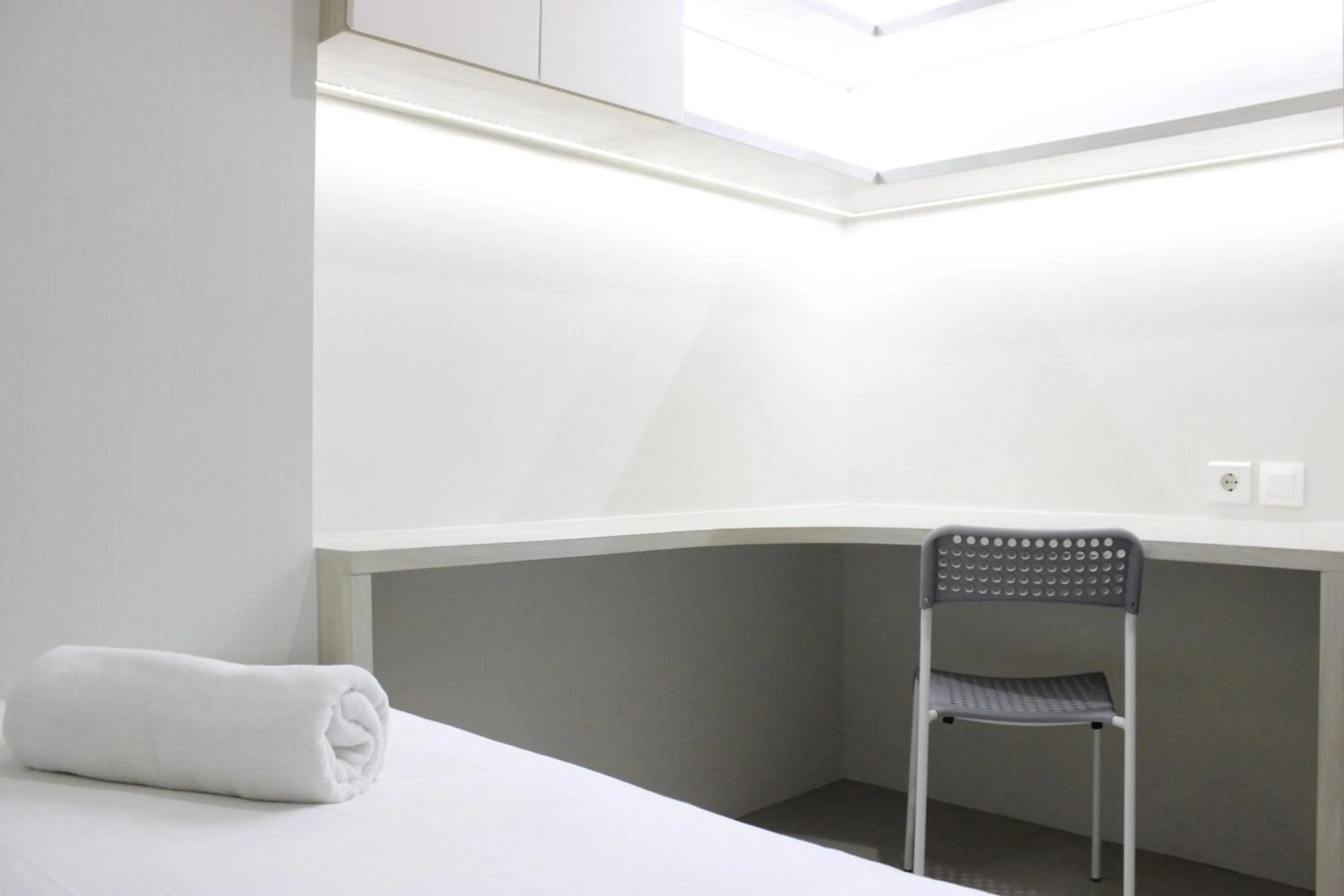 Bright and Stylish 2BR at Gateway Pasteur Apartment By Travelio