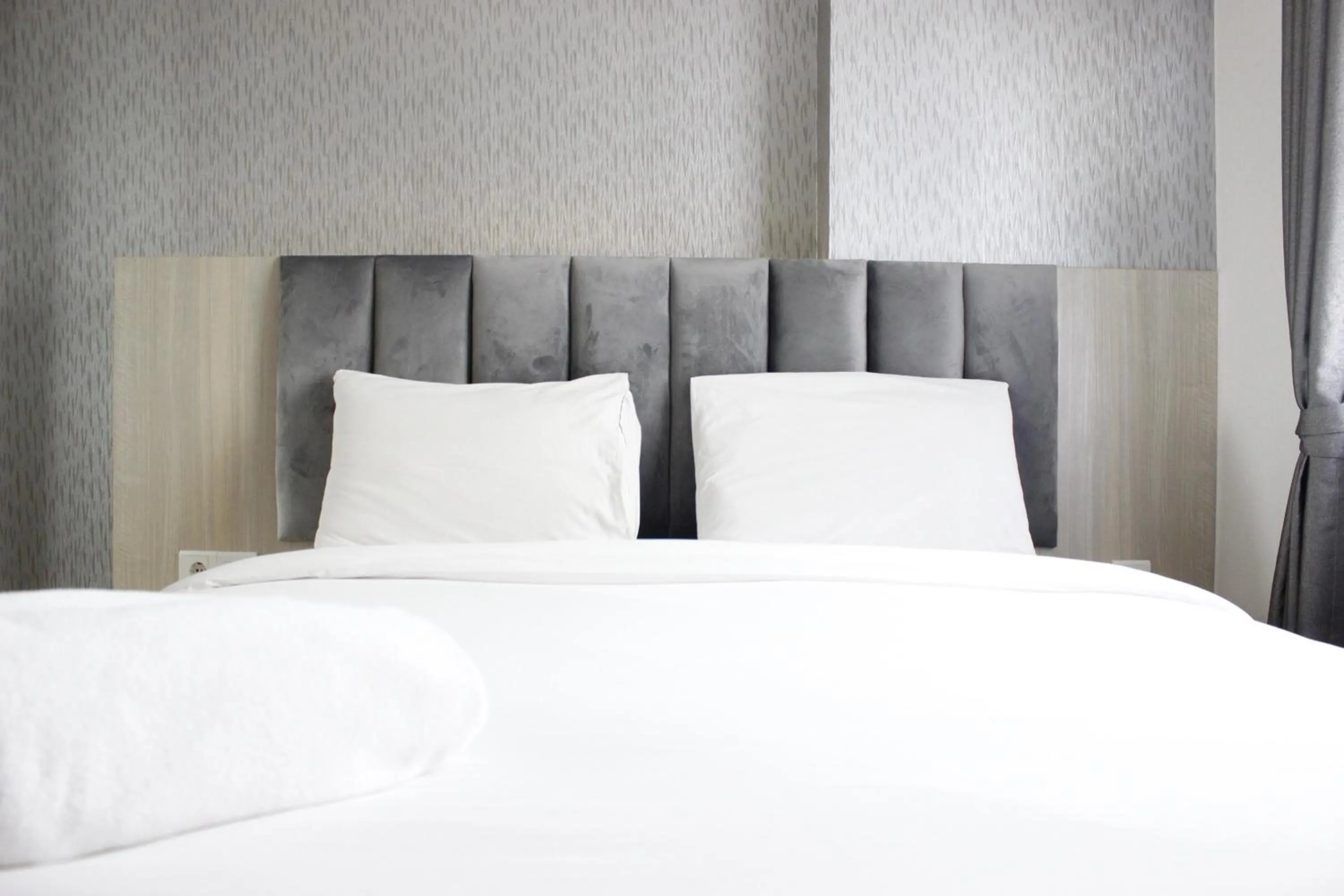 Bright and Stylish 2BR at Gateway Pasteur Apartment By Travelio