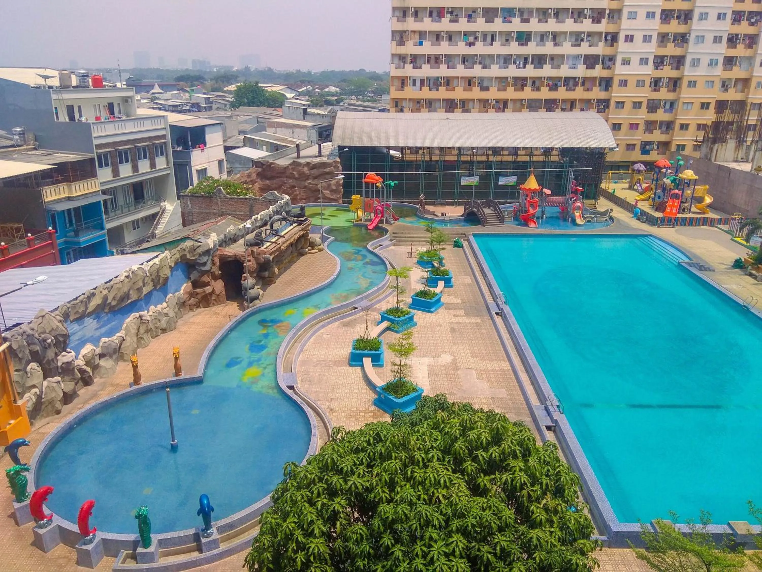 Property building in Best Price 1BR Apartment at Teluk Intan By Travelio