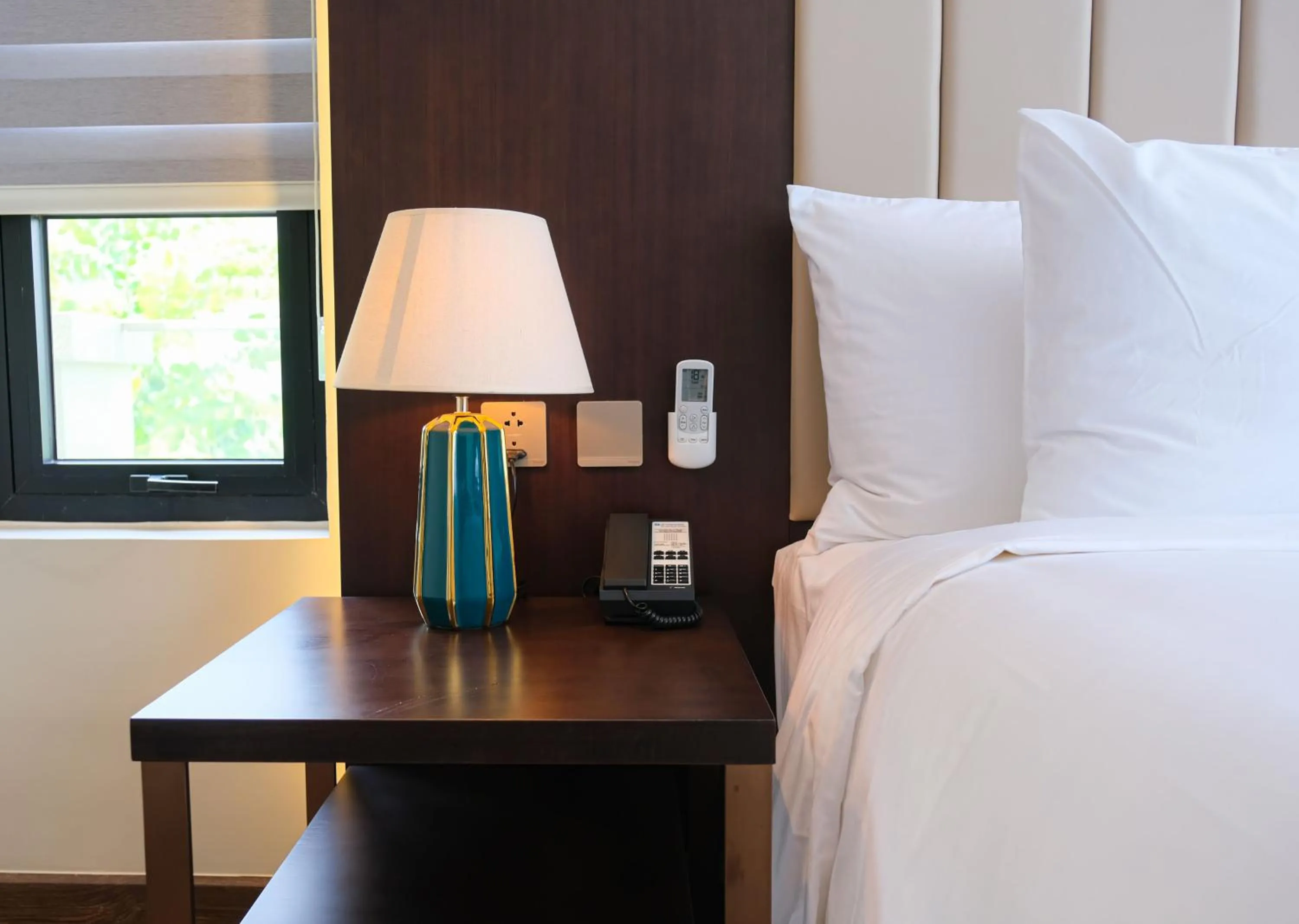 Bed in Wyndham Sky Lake Resort and Villas