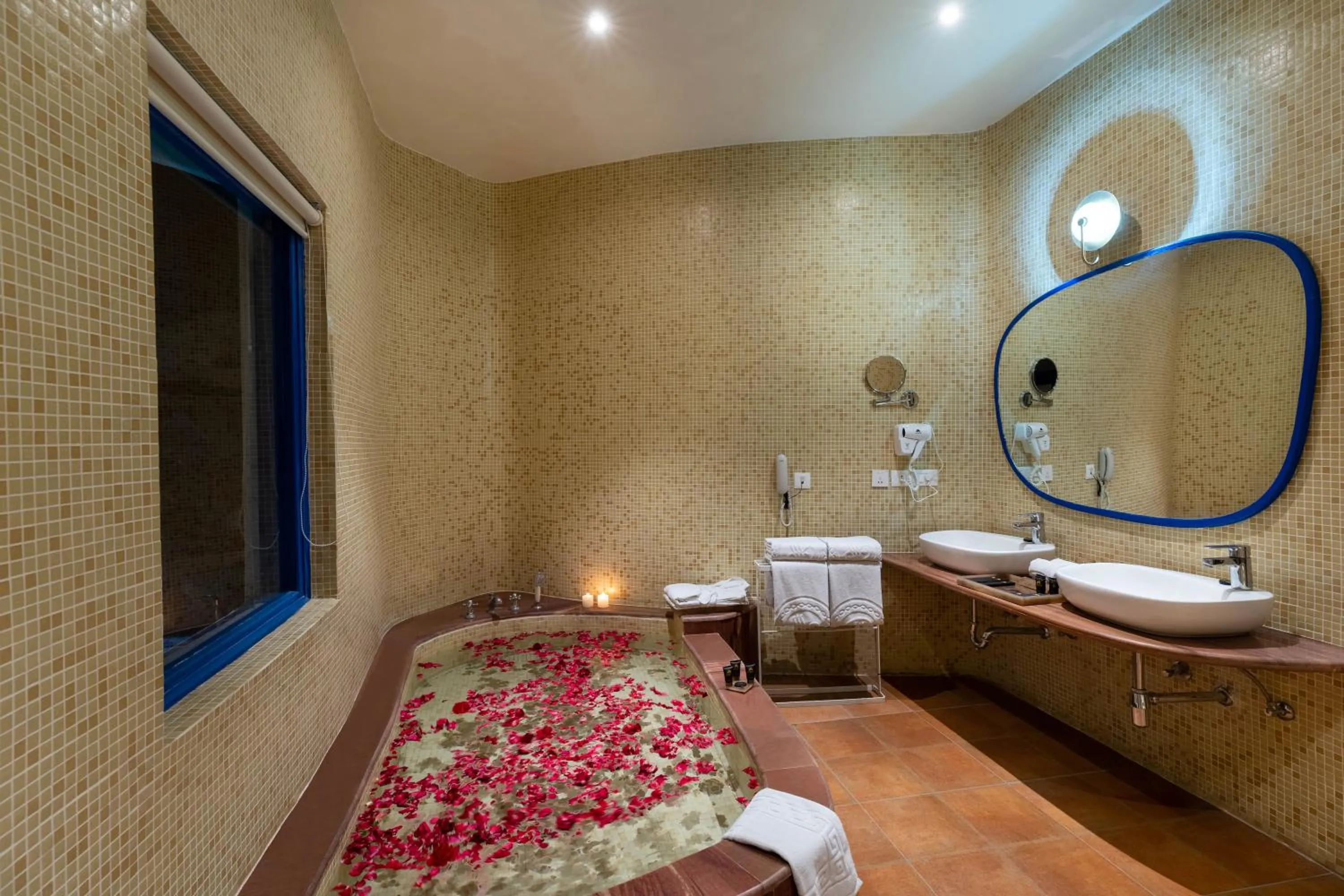 Bathroom, Bed in Ramee Royal Resort & Spa - Udaipur