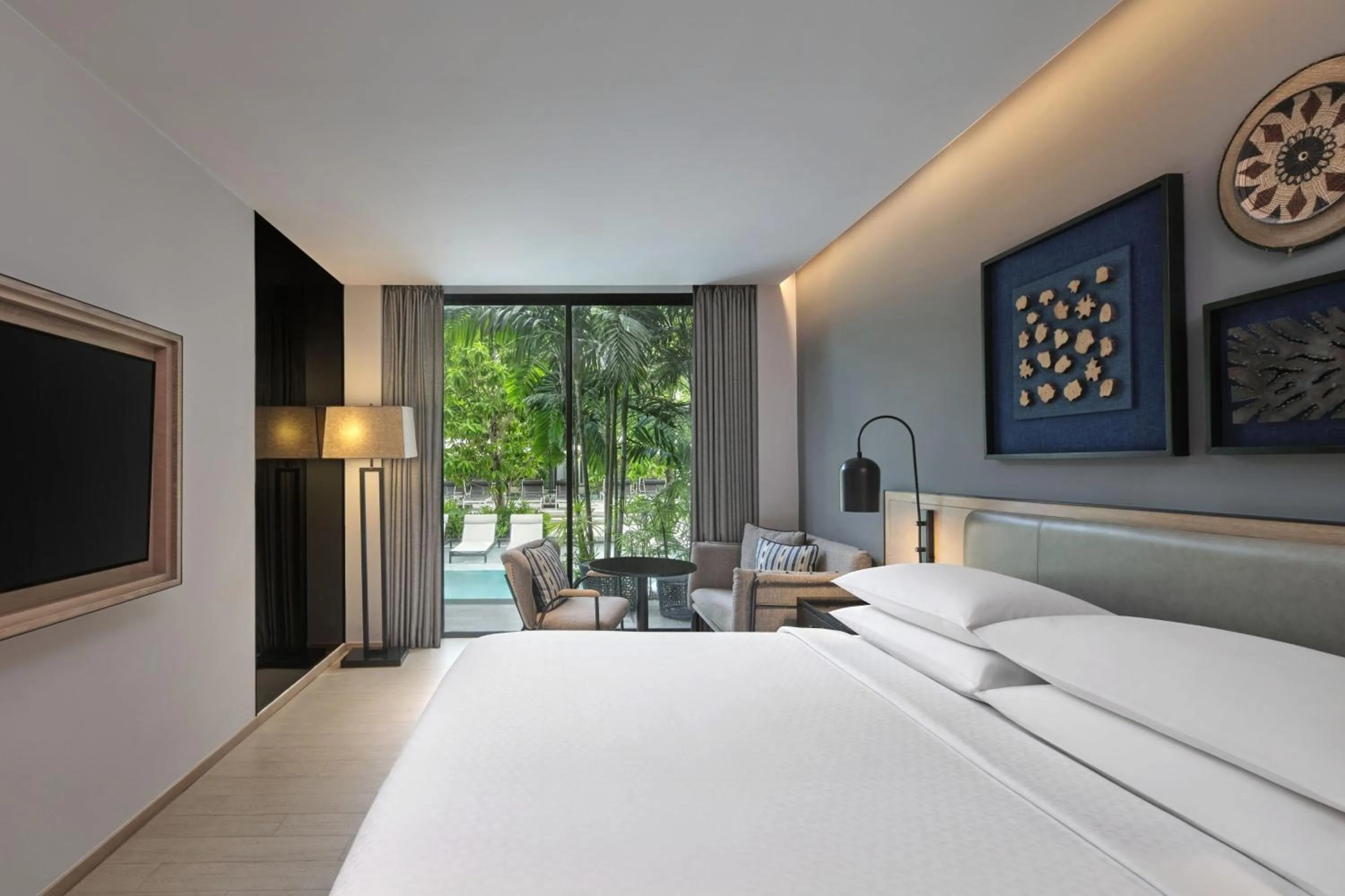 Swimming pool, Bed in Four Points by Sheraton Phuket Patong Beach Resort